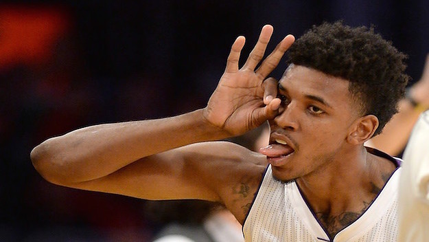 Nick Young celebrates a three point shot