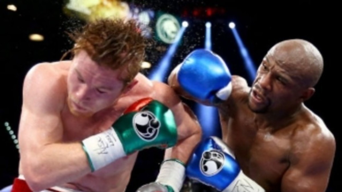 Floyd Mayweather Moves To 45 0 With Decision Over Canelo Alvarez