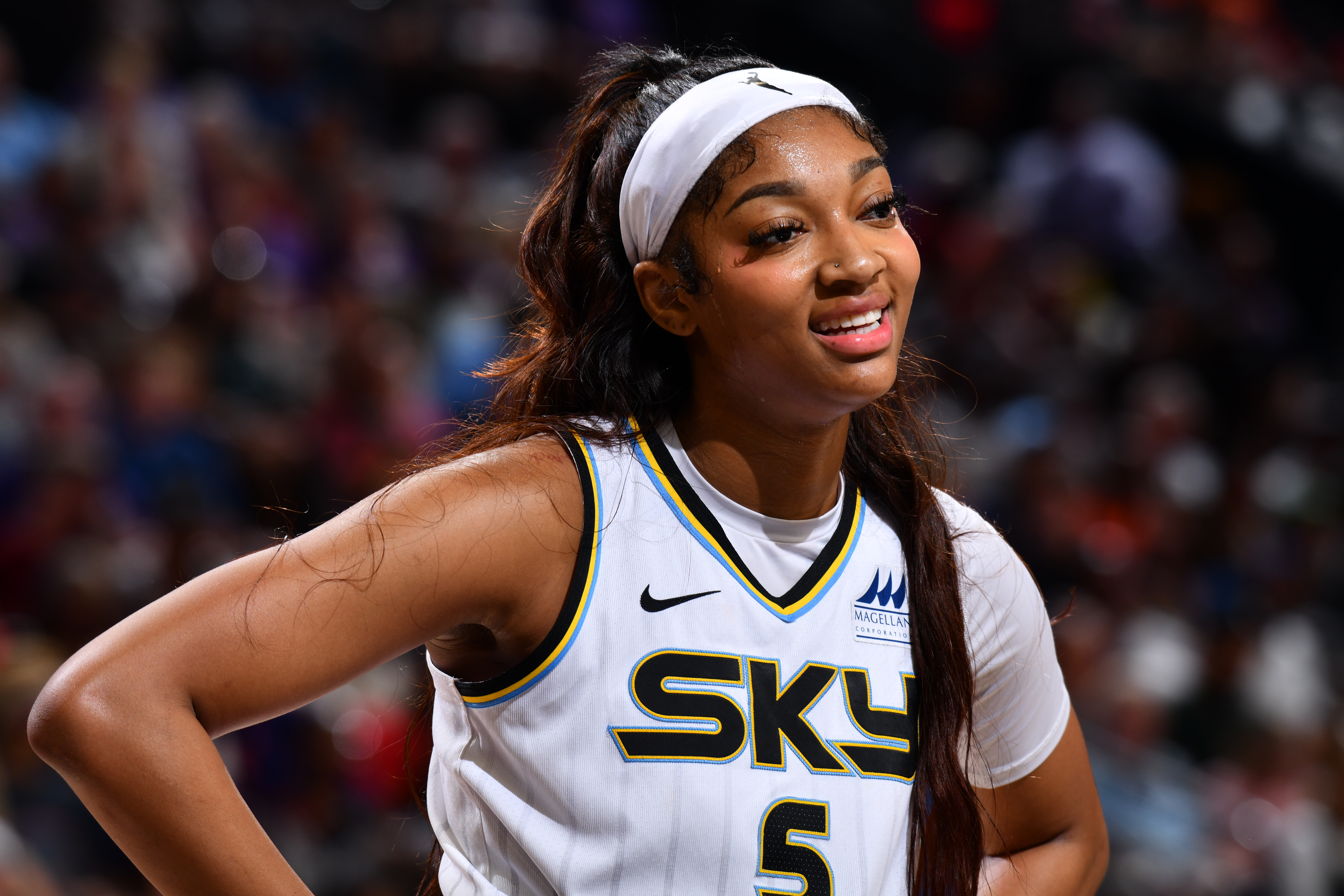 PHOENIX, AZ - AUGUST 18: Angel Reese #5 of the Chicago Sky smiles during the game against the Phoenix Mercury on August 18, 2024 at Footprint Center in Phoenix, Arizona. 