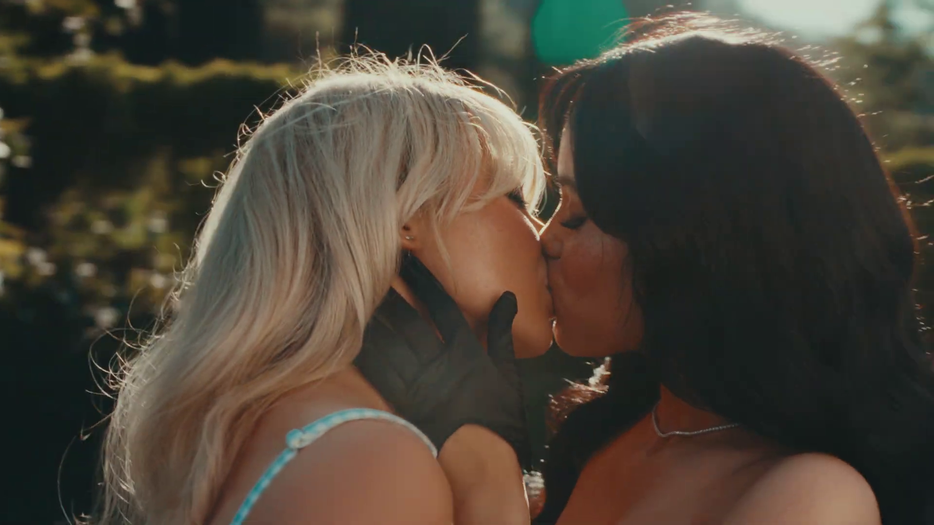 Sabrina Carpener and Jenna Ortega share a kiss