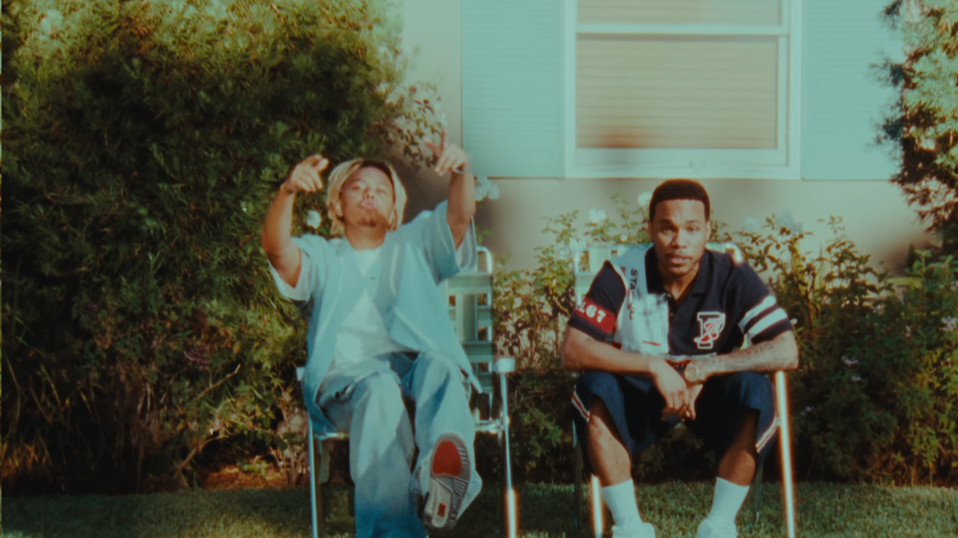 Cordae and Anderson .Paak in the video for "Summer Drop."
