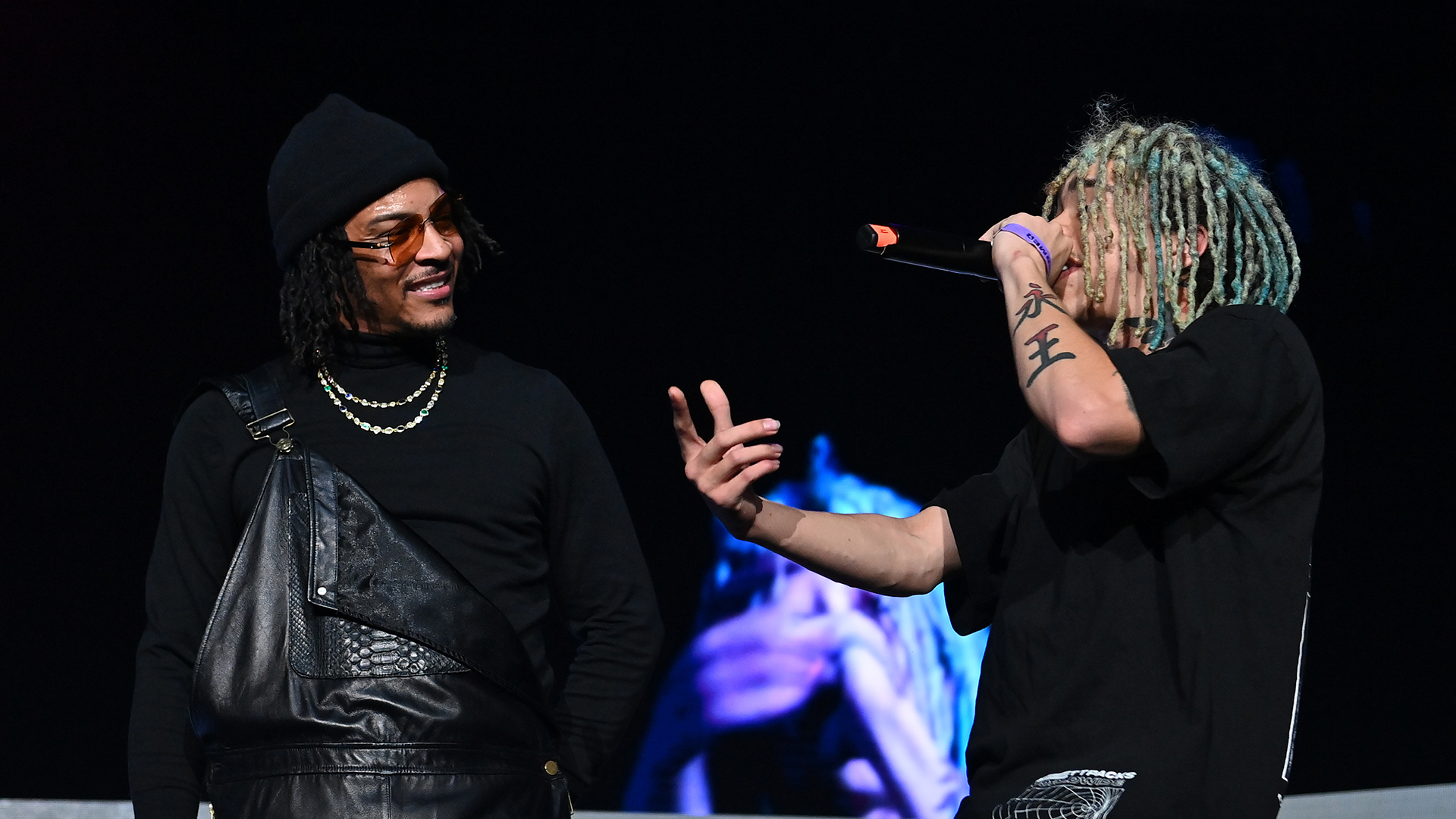 T.I. and King Harris perform onstage during 2023 V-103 Winterfest