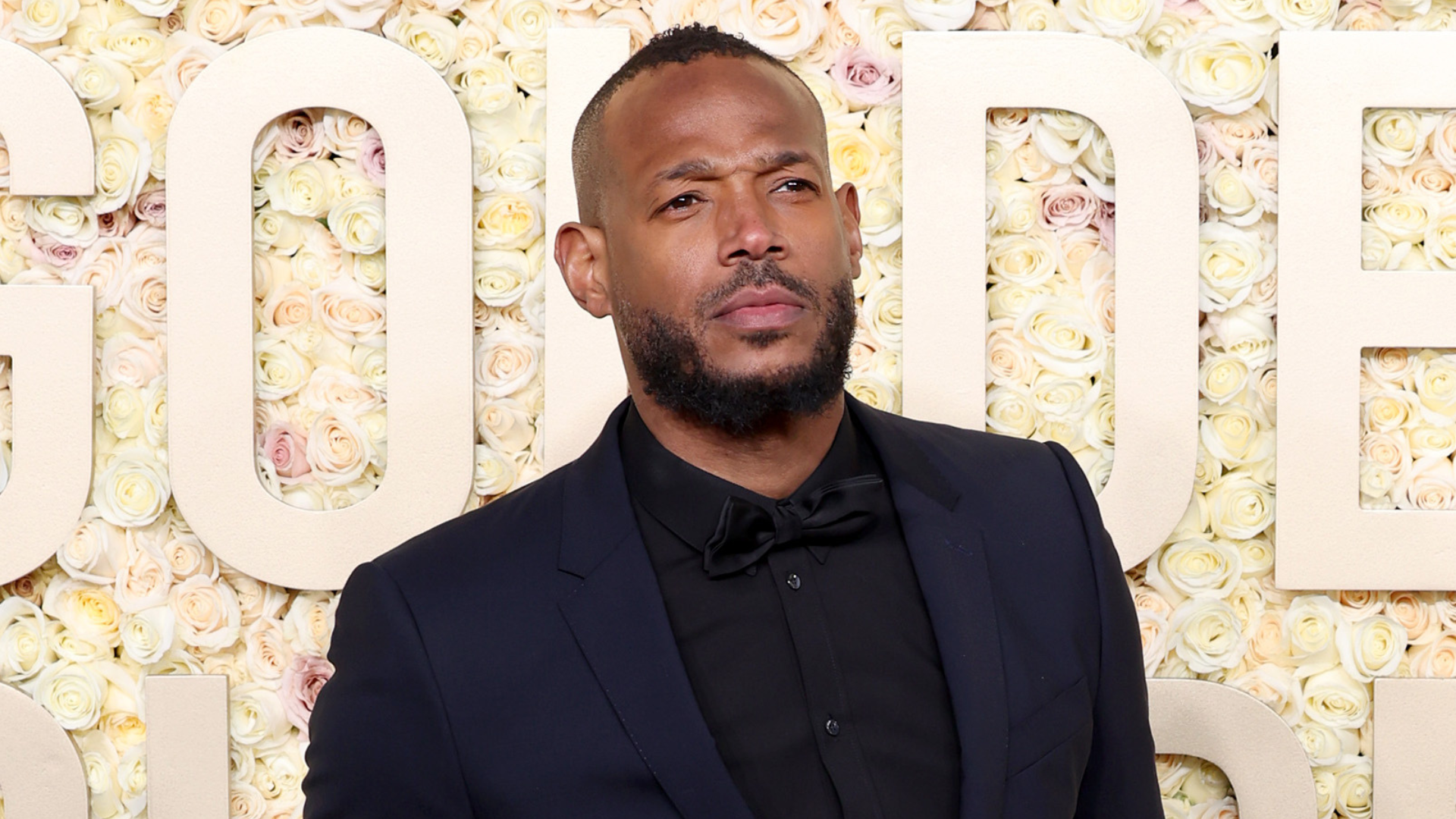Marlon Wayans attending an event.