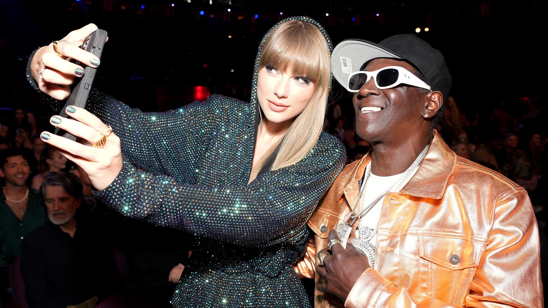 Taylor Swift and Flavor Flav at the 2023 iHeartRadio Music Awards.