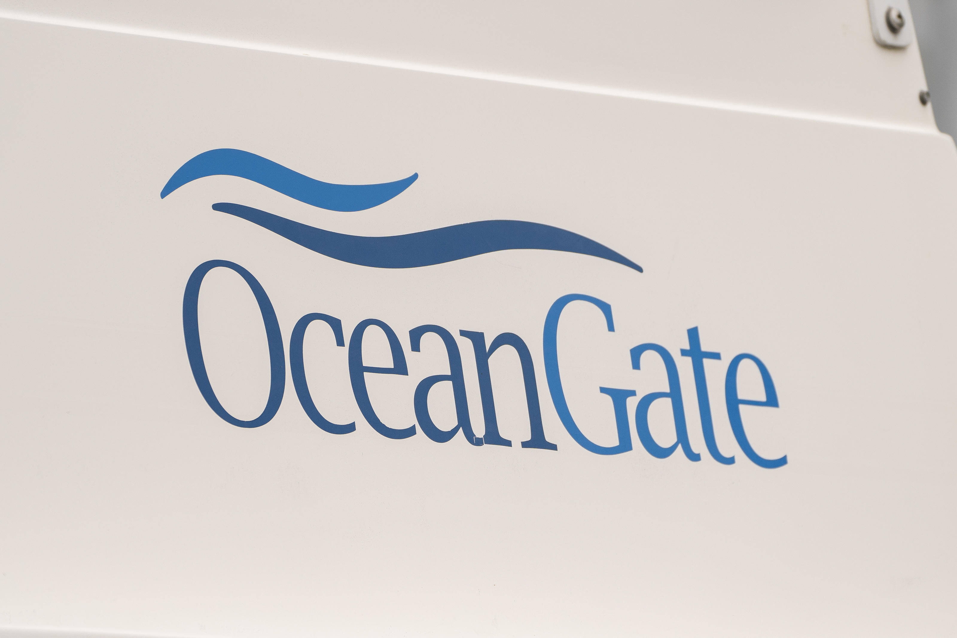 The OceanGate logo is seen on a vessel stored near the OceanGate offices on June 21, 2023 in Everett, Washington. OceanGate, owner of the missing submersible carrying five people trying to visit the Titanic wreckage in the North Atlantic, operates out of Everett.