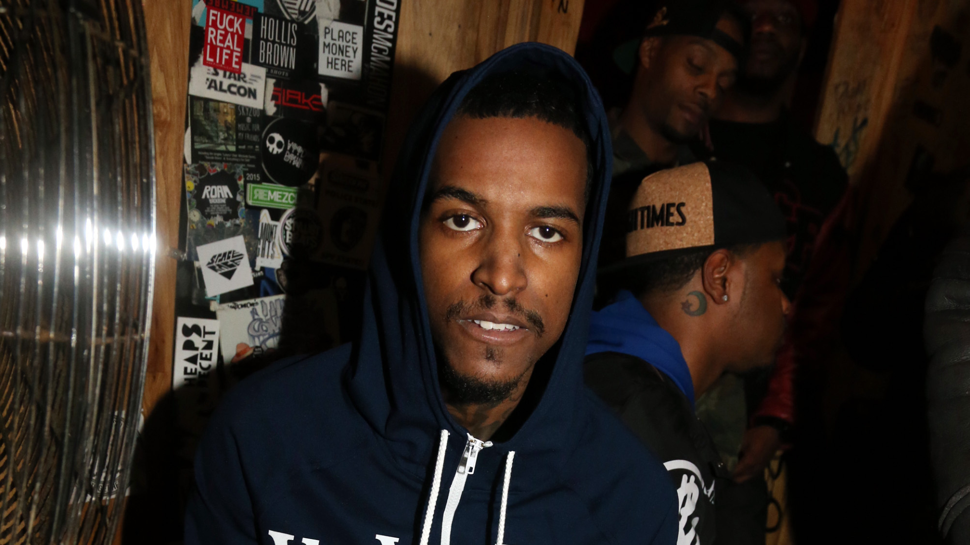 Lil Reese attending an event.