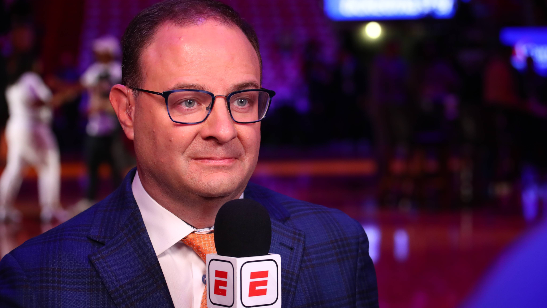 Adrian Wojnarowski at a game