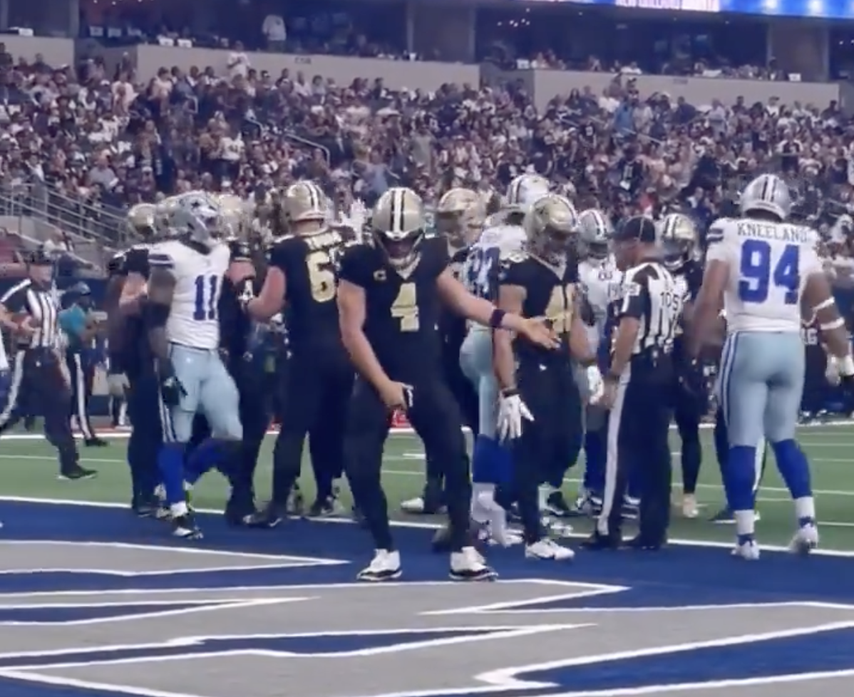Derek Carr grabs his crotch in celebration of a touch down.