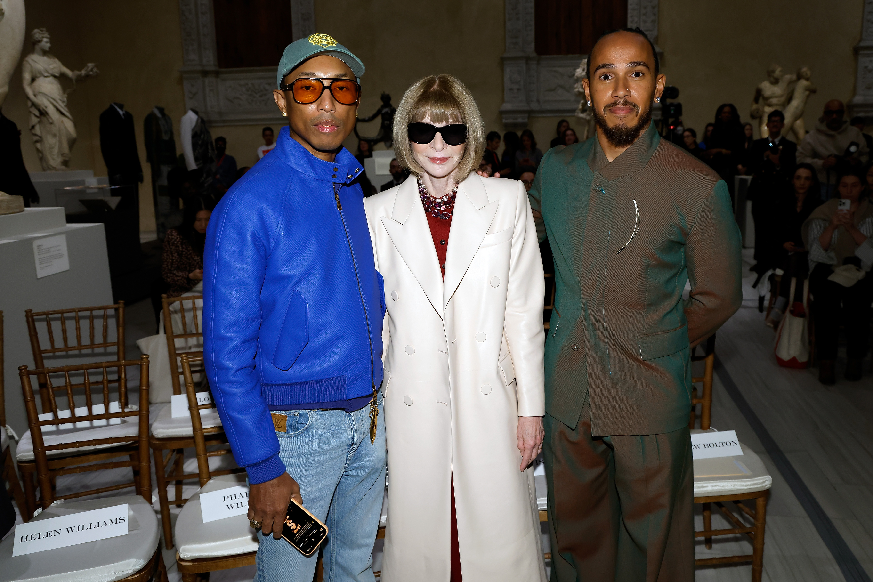 Pharrell Williams, Anna Wintour, and Lewis Hamilton attend a press conference announcing the Spring 2025 Costume Institute exhibition "Superfine: Tailoring Black Style" at Metropolitan Museum of Art on October 09, 2024 in New York City.