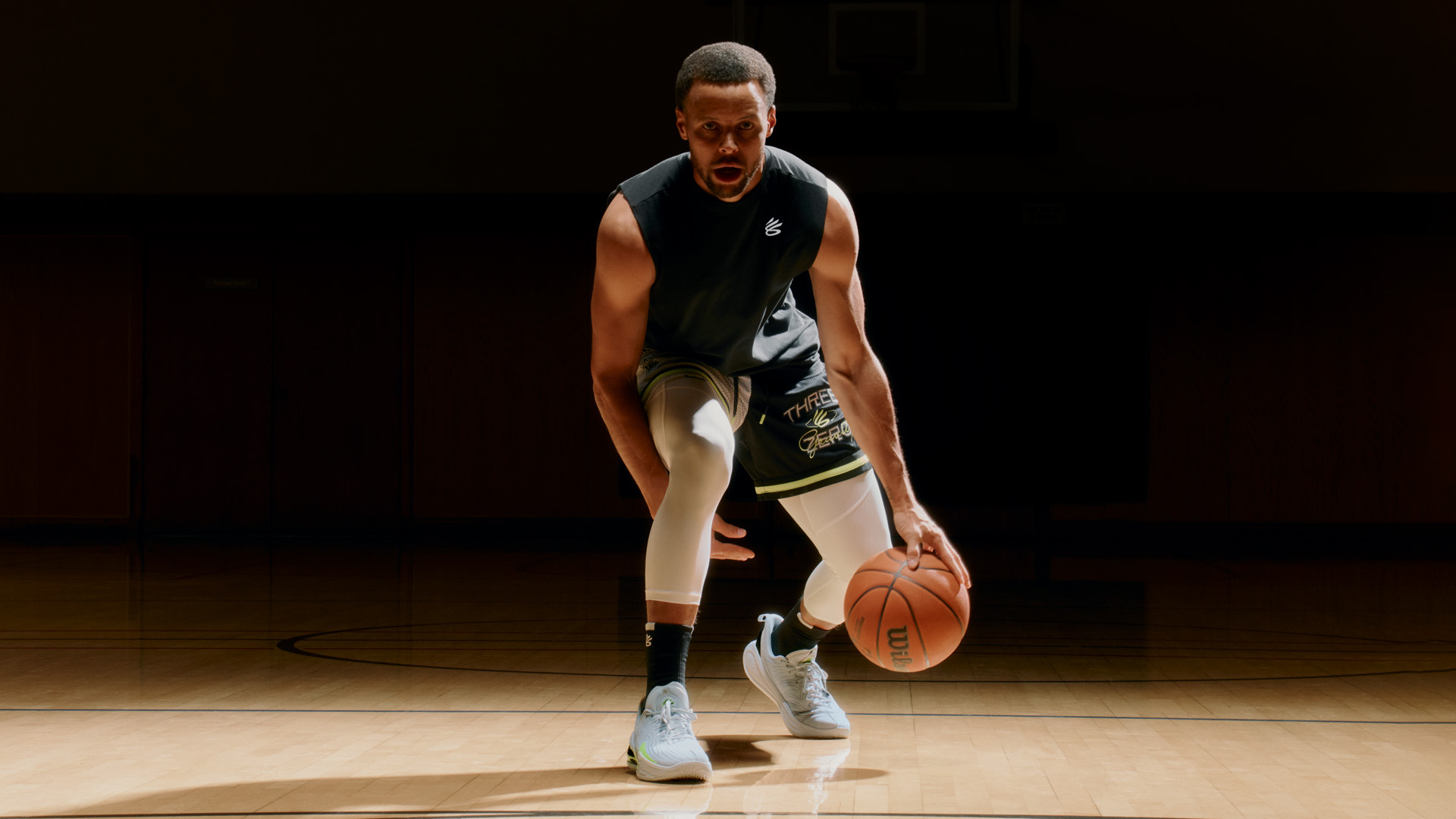 Steph Curry playing basketball in the Under Armour Curry 12