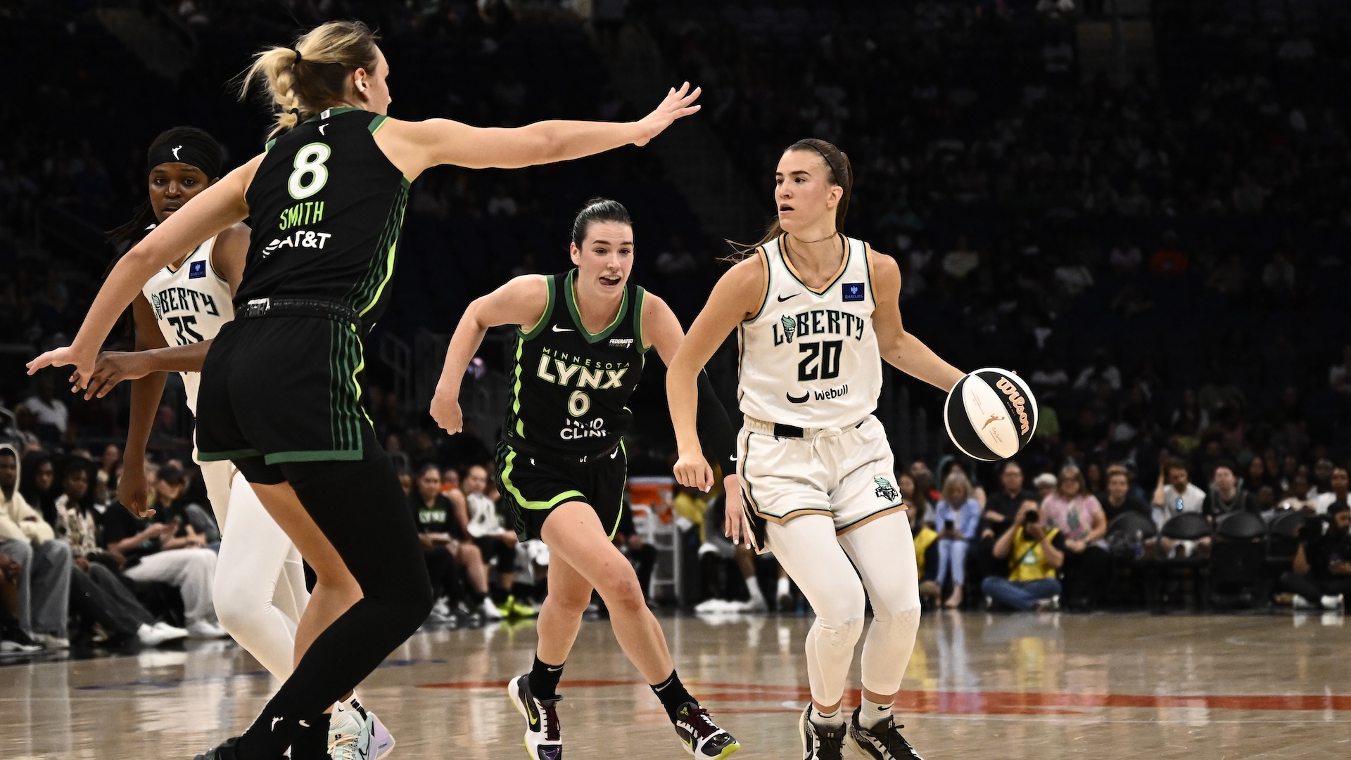 Sabrina Ionescu #20 of the New York Liberty dribbles the ball during the game against the Minnesota Lynx