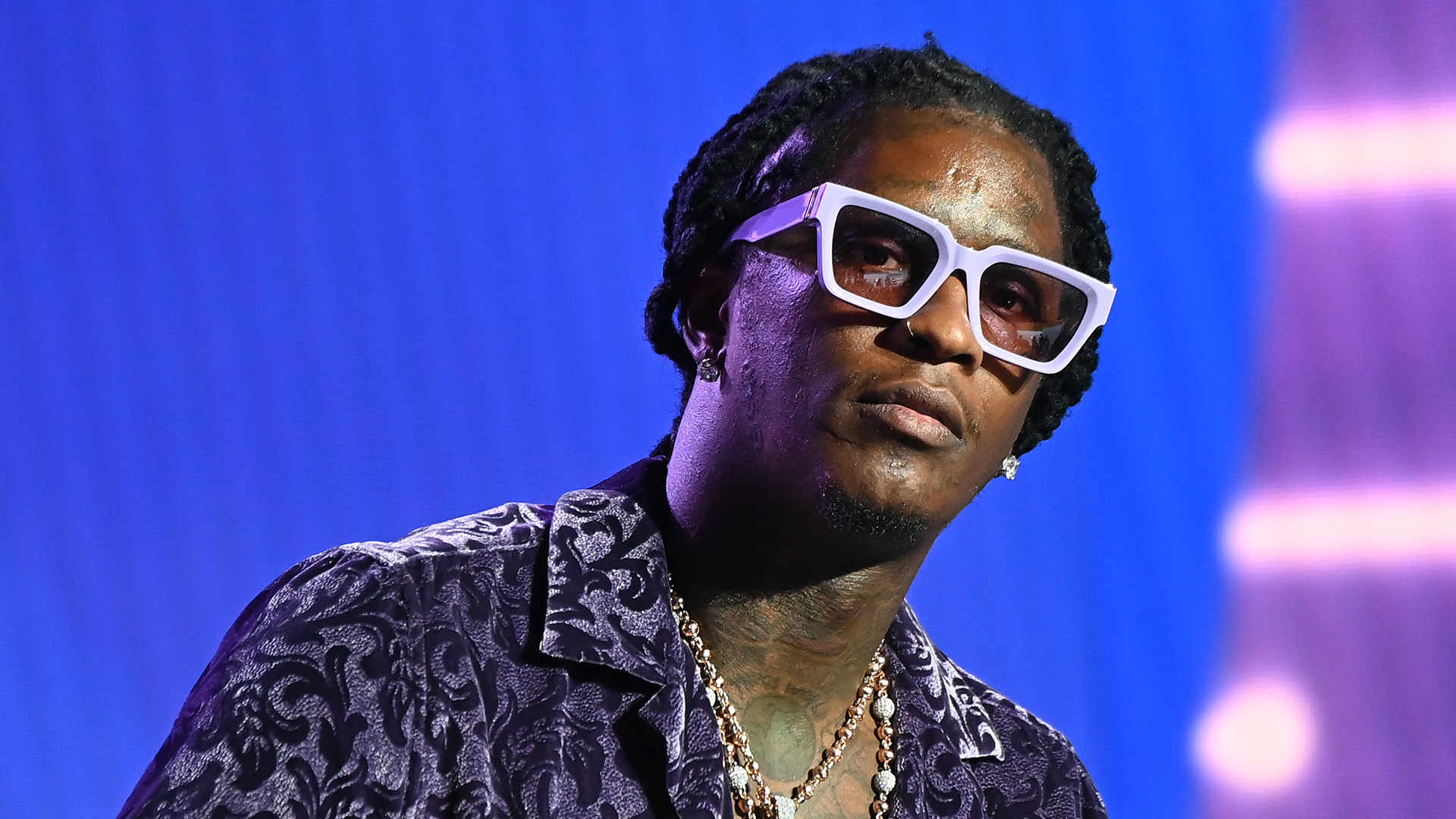 Rapper Young Thug speaks onstage at the 2021 REVOLT Summit.