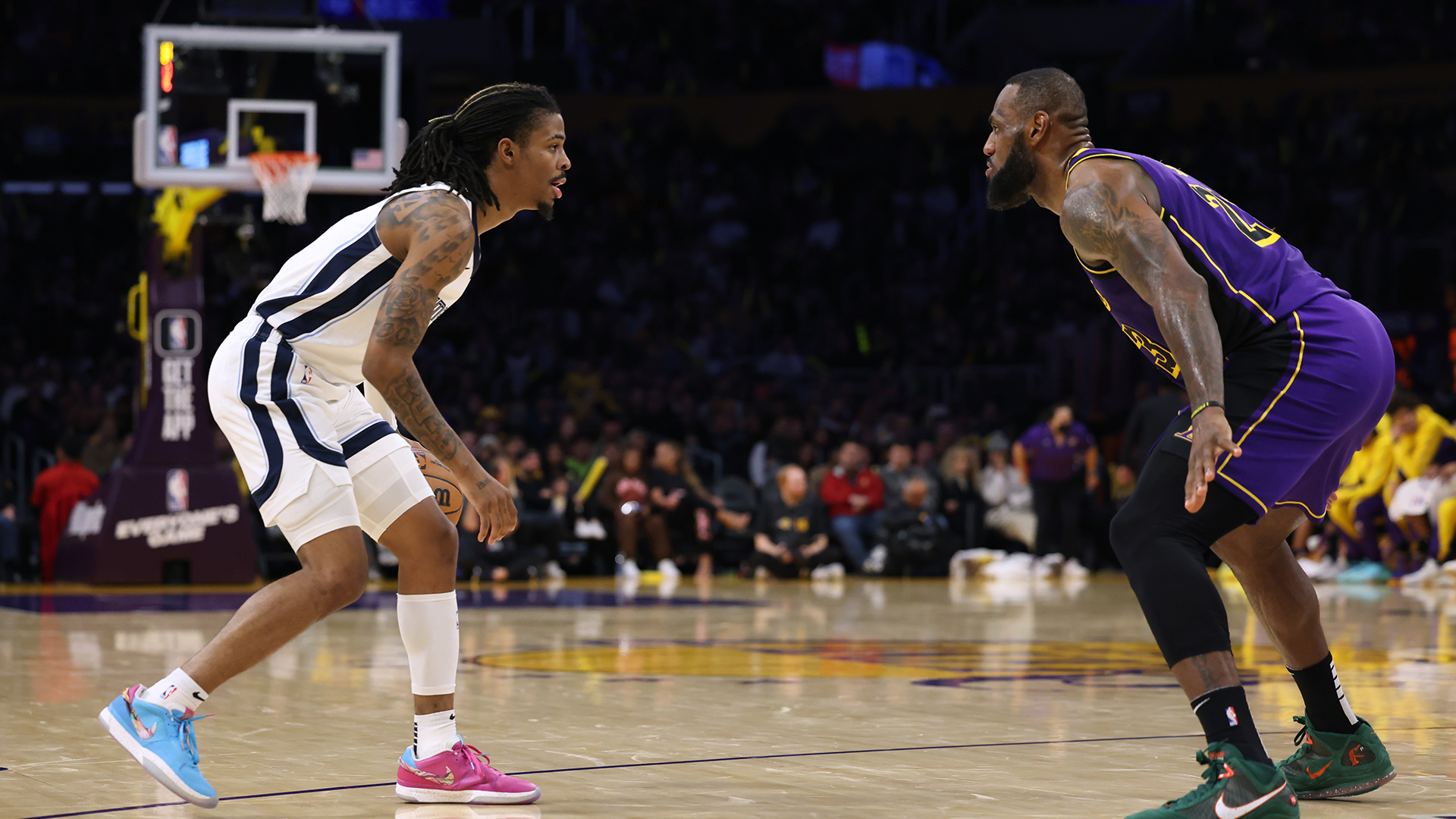 Ja Morant of the Grizzlies faces off against LeBron James of the Lakers.