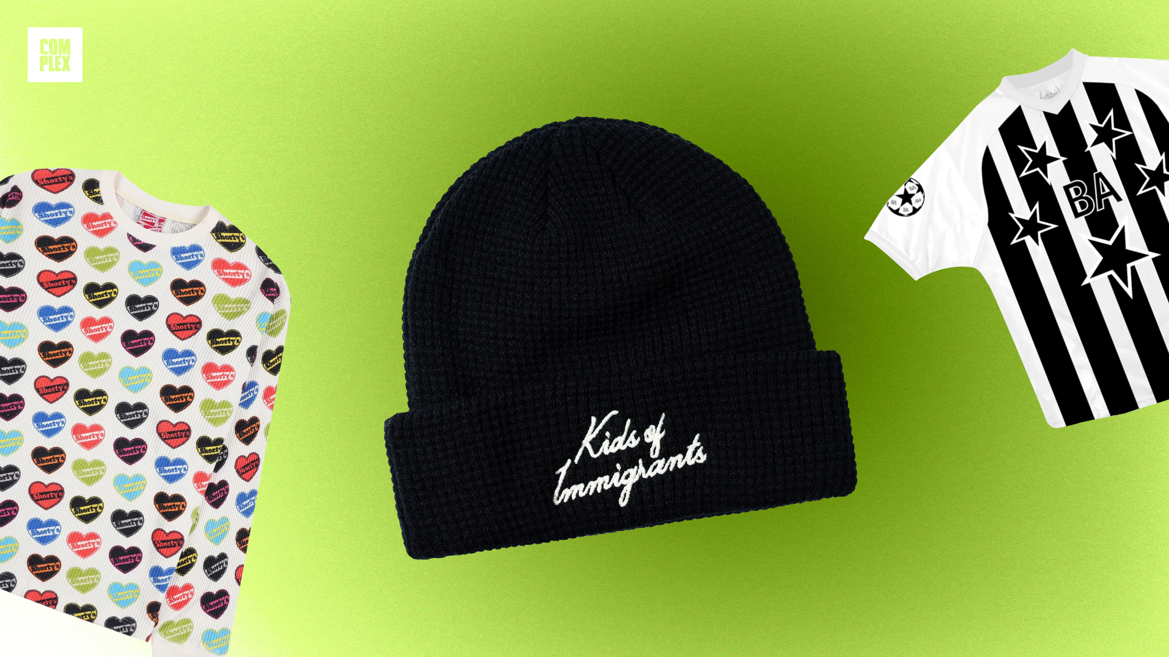 A black beanie with "Kids of Immigrants" text, a shirt with a Virgin Mary design, and a T-shirt with "Jesus and Mary Chain" text.