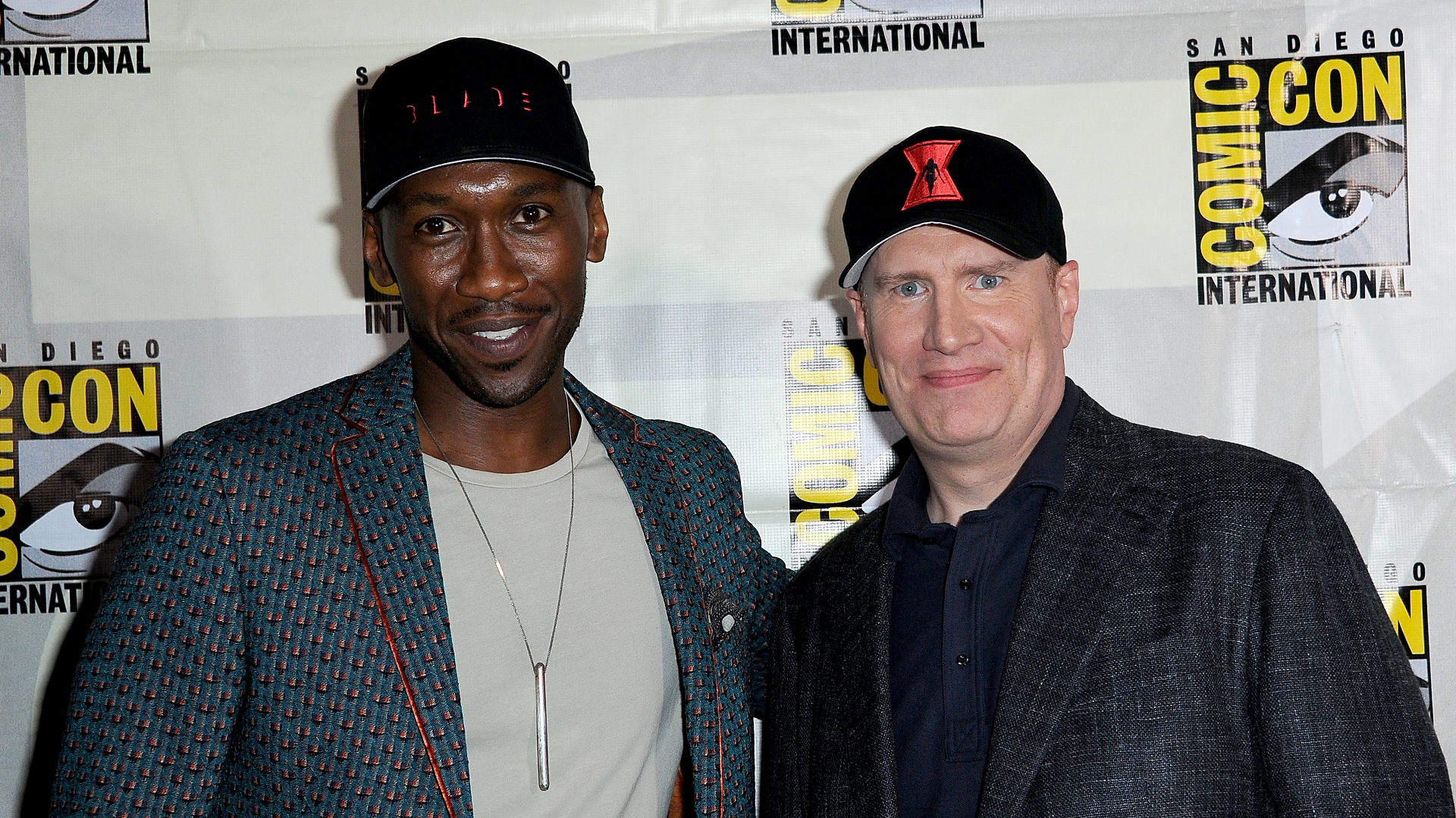 Mahershala Ali and Kevin Feige pose for photo together at 2019 Comic-Con International.