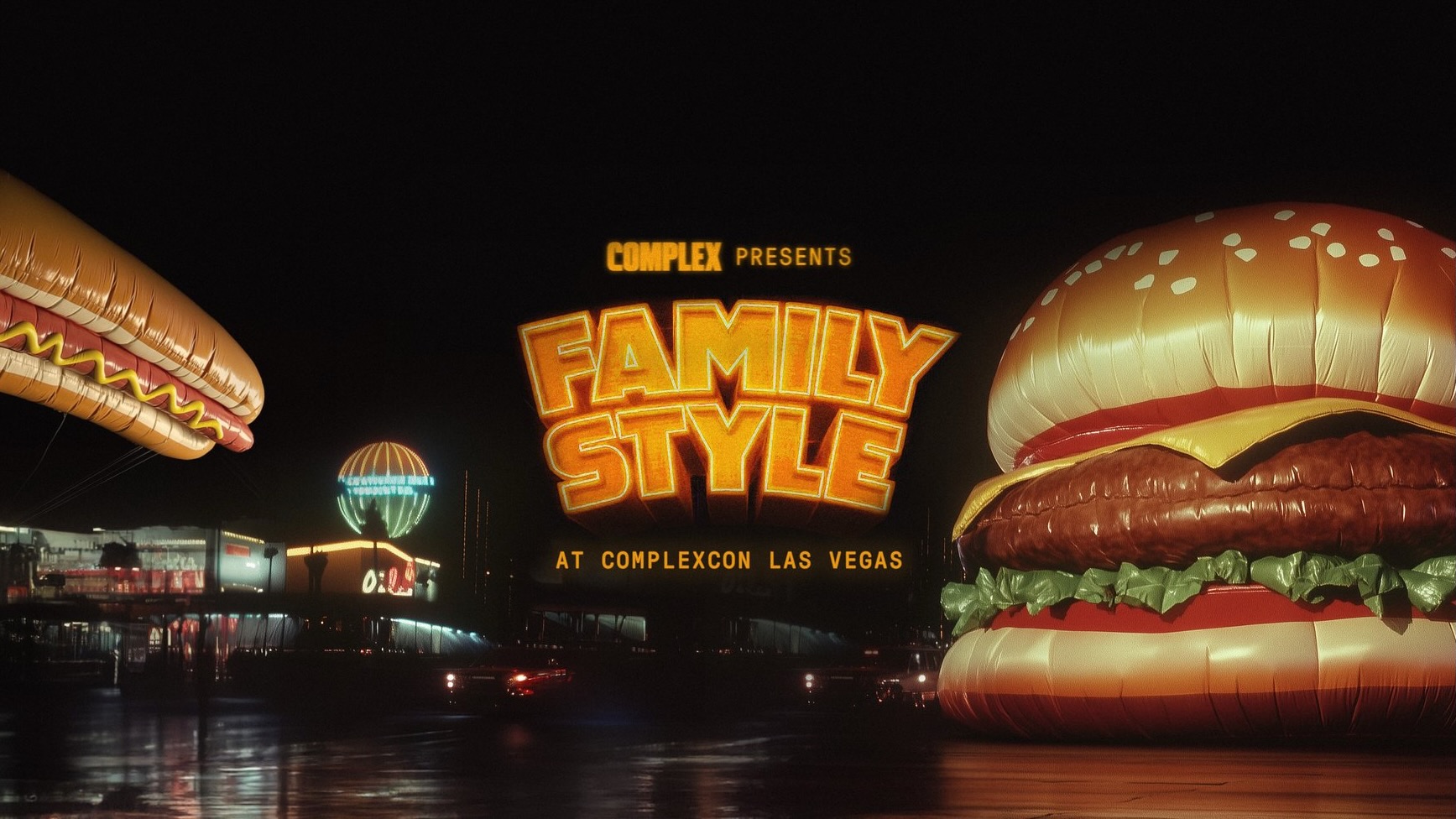 Giant inflatable hot dog and burger with "Complex Presents Family Style at ComplexCon Las Vegas" in neon lights at night.