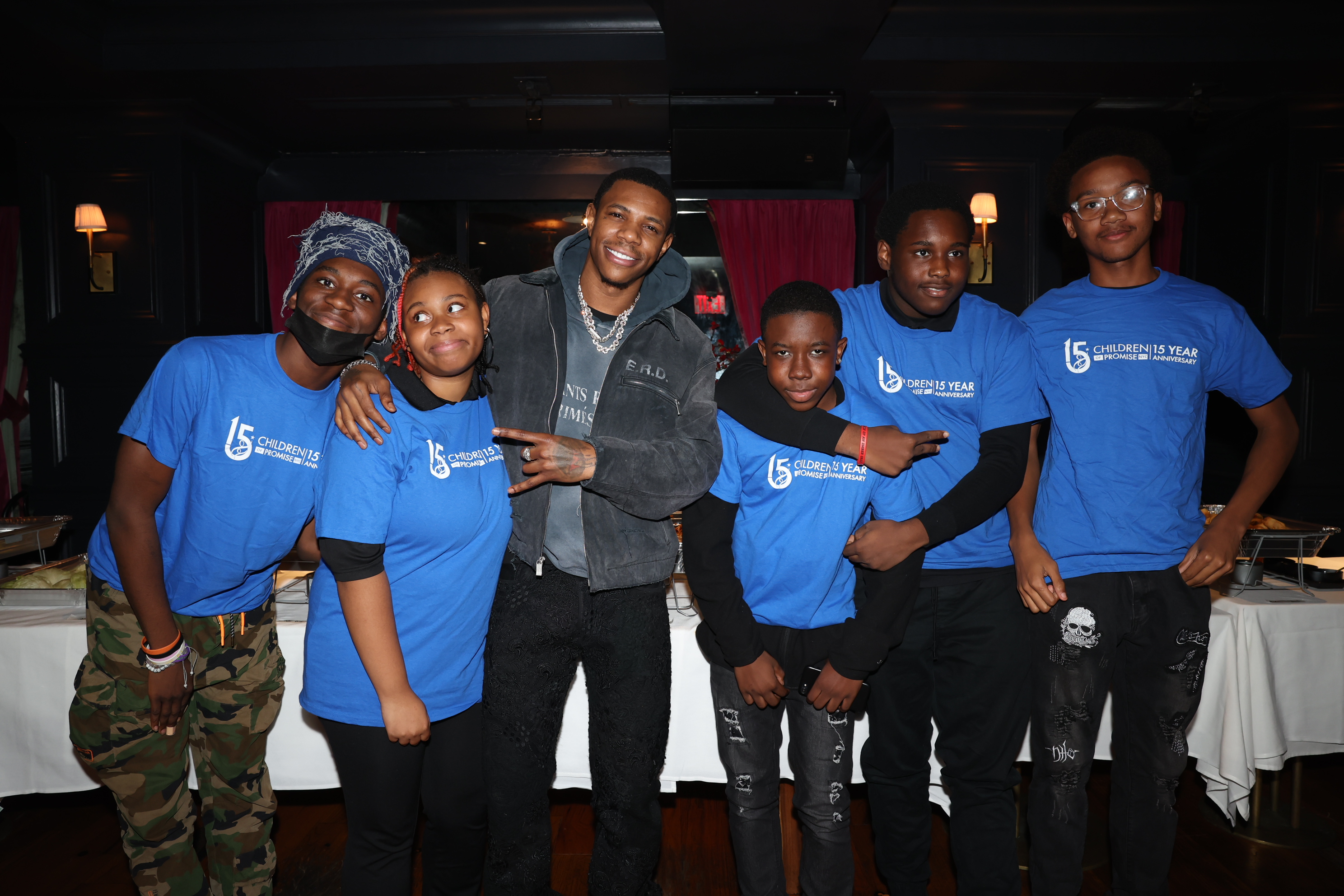 A Boogie Wit Da Hoodie at a Thanksgiving dinner for Children of Promise NYC