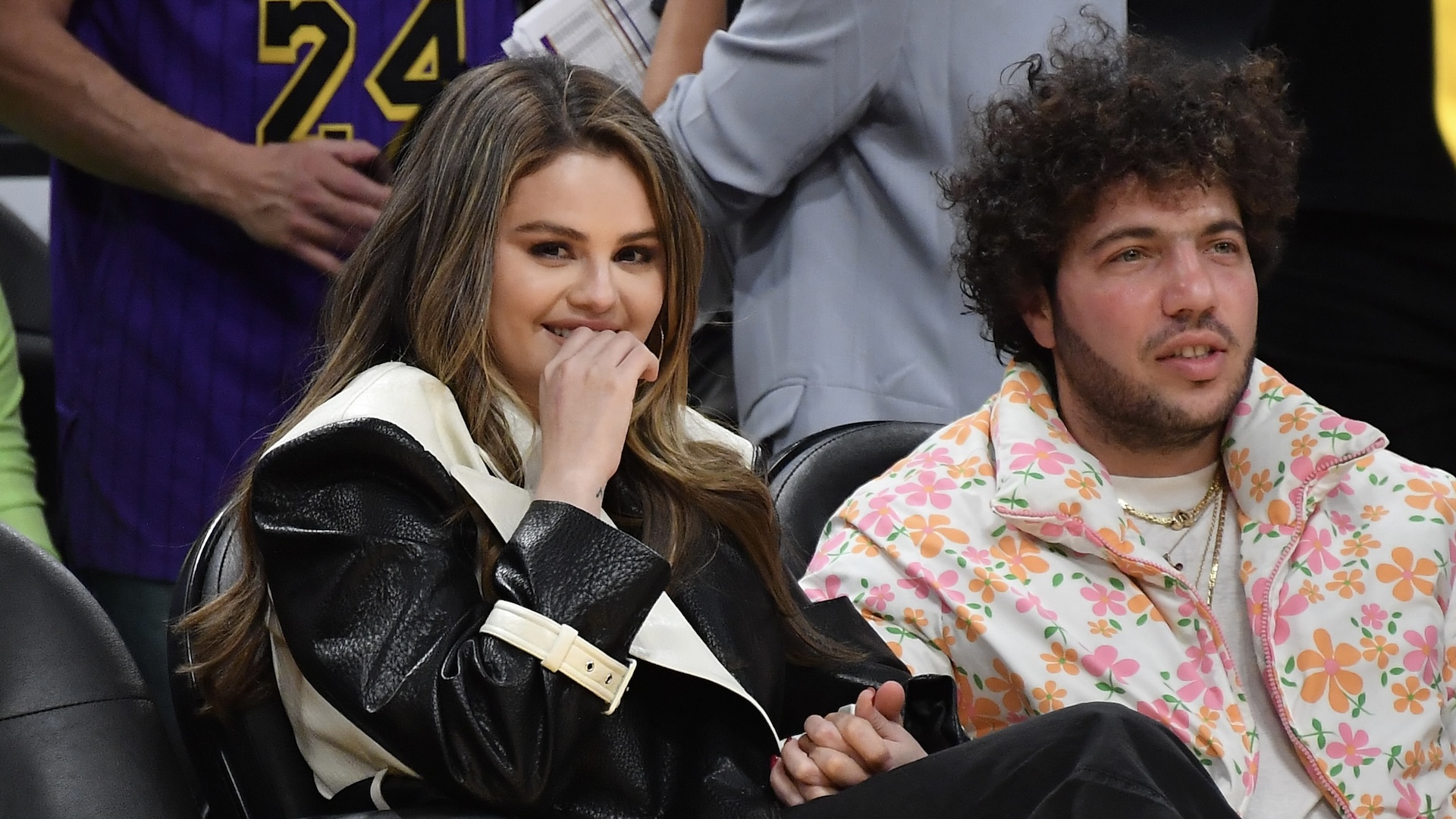  Selena Gomez and Benny Blanco attend a basketball game 