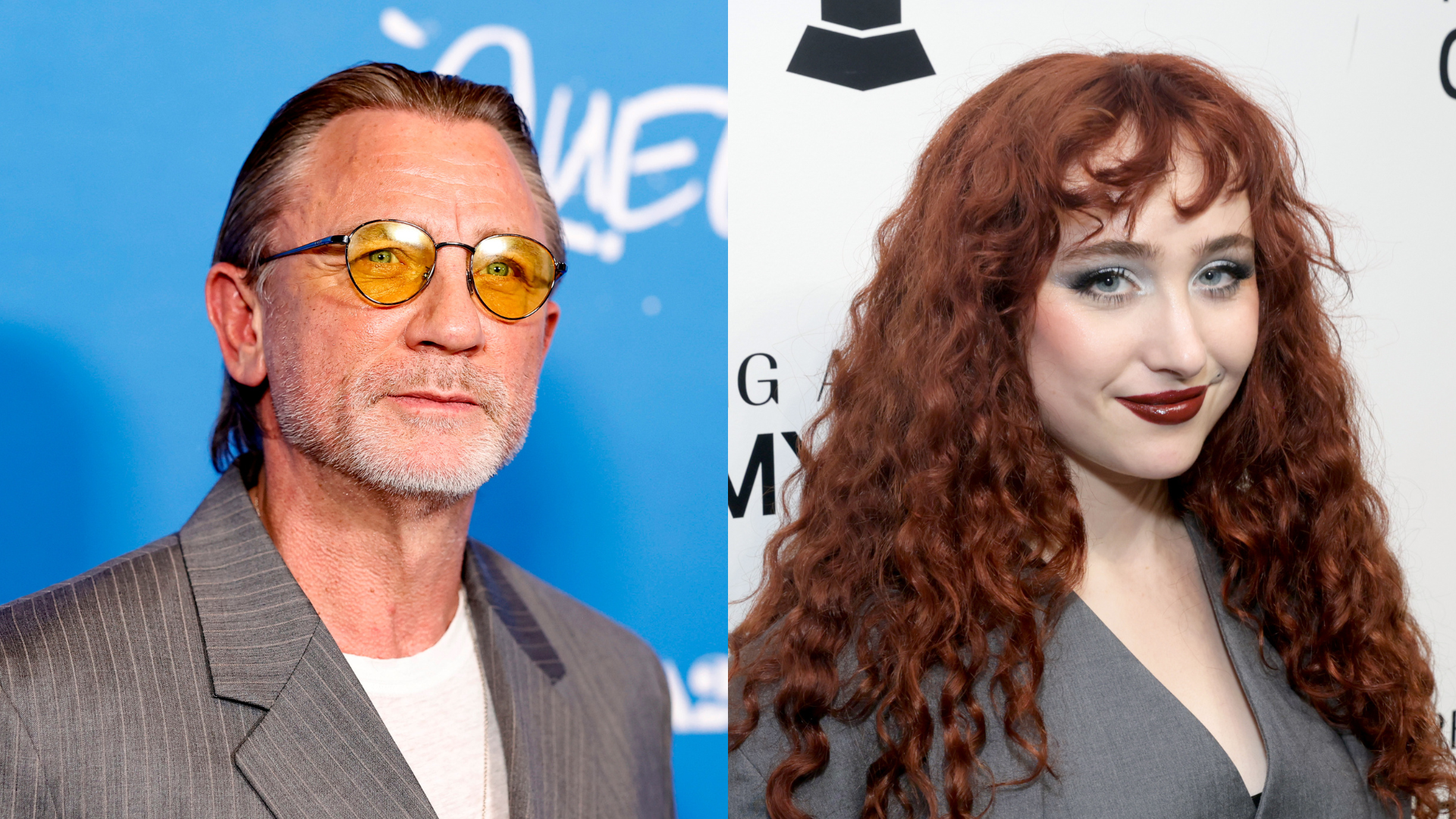Daniel Craig in a suit with yellow glasses; Rachel Brosnahan with long red hair in a grey outfit.