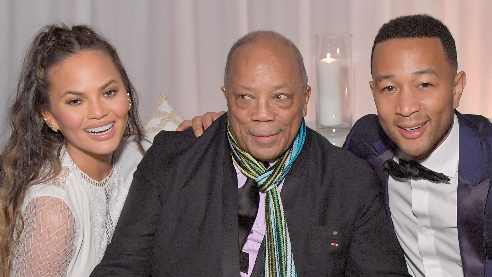 (L-R) Model Chrissy Teigen, producer Quincy Jones and recording artist John Legend attend The Art of Elysium presents Stevie Wonder's HEAVEN - Celebrating the 10th Anniversary at Red Studios on January 7, 2017 in Los Angeles, California.