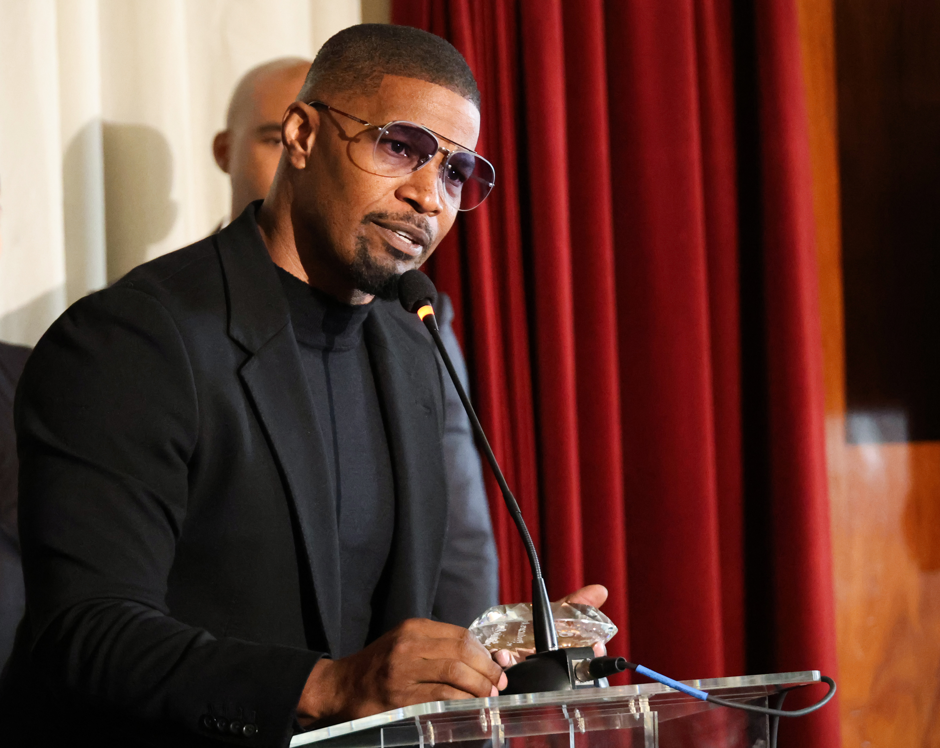 LOS ANGELES, CALIFORNIA - MARCH 03: Jamie Foxx accepts the Producers Award onstage during the AAFCA Special Achievement Honorees Luncheon at The Los Angeles Athletic Club on March 03, 2024 in Los Angeles, California.