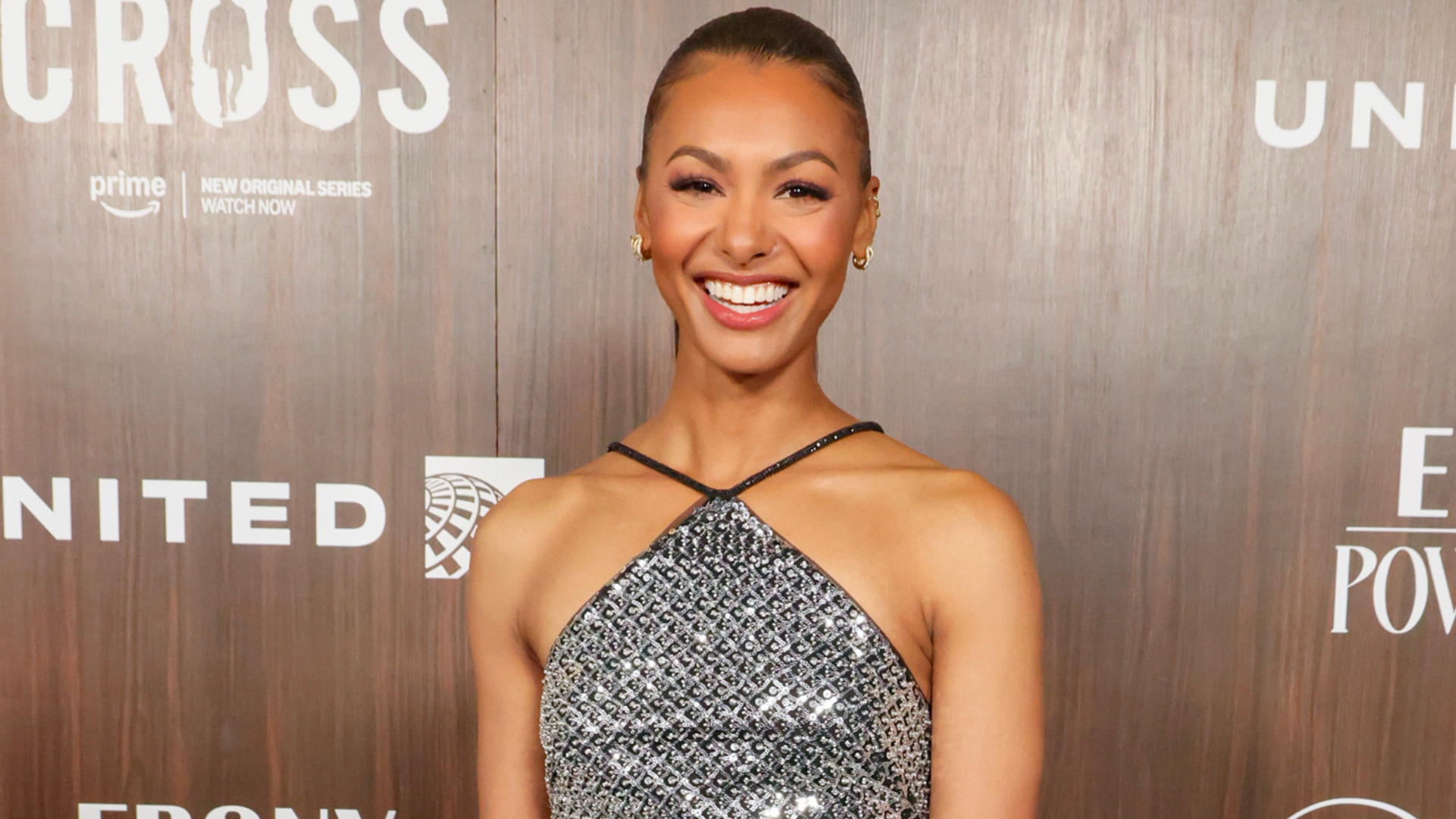 Malika Andrews at an event.