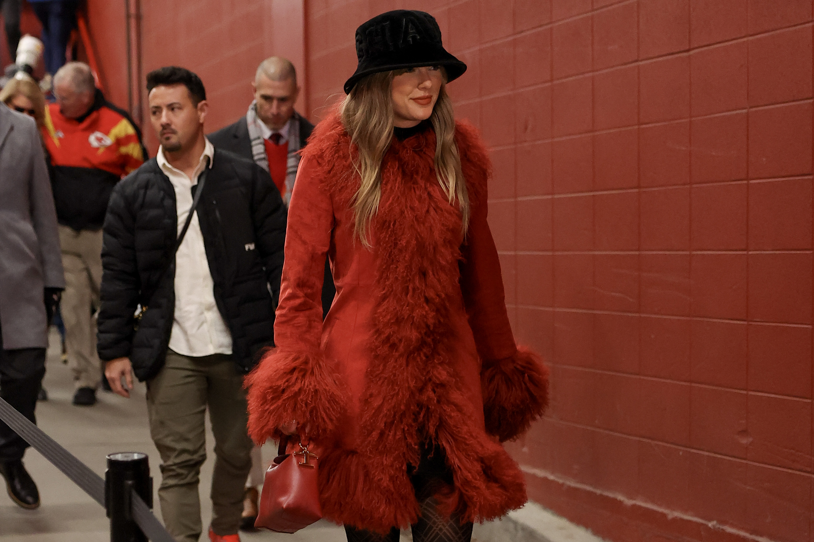 KANSAS CITY, MISSOURI - DECEMBER 21: Taylor Swift looks on prior to a game between the Kansas City Chiefs and the Houston Texans at GEHA Field at Arrowhead Stadium on December 21, 2024 in Kansas City, Missouri.