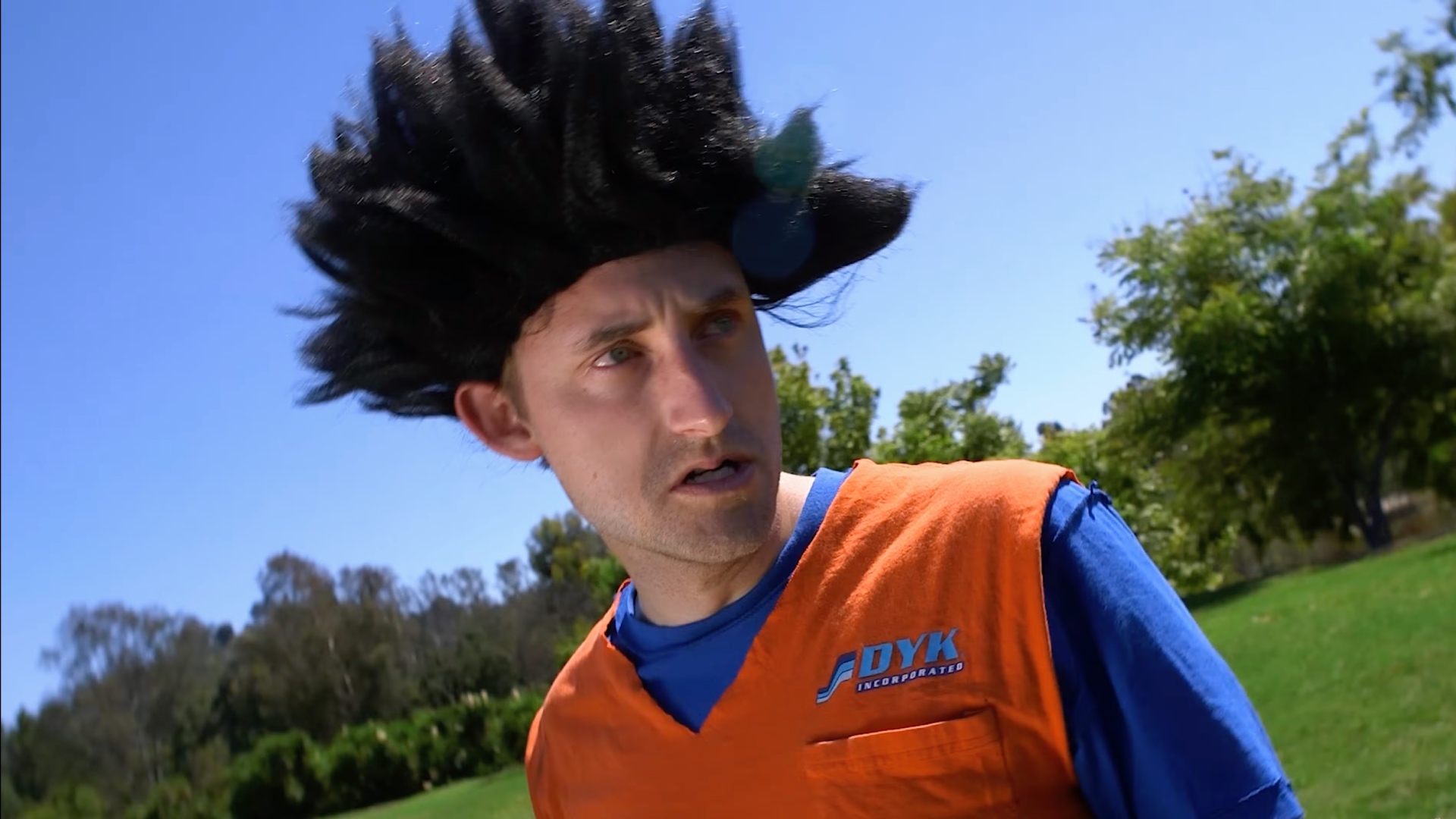 A discount, live-action Goku (Shawn Chatfield of Mega64) stares intently at something off-screen.