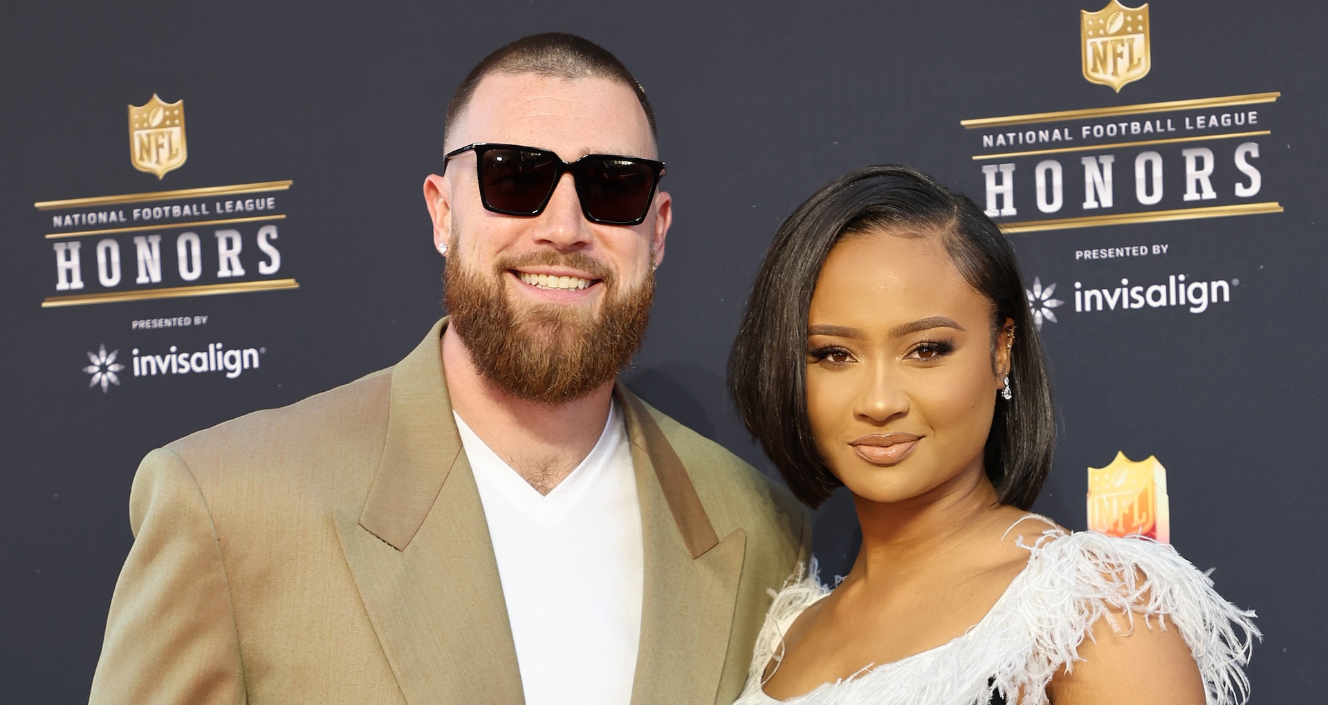 INGLEWOOD, CALIFORNIA - FEBRUARY 10: (L-R) Travis Kelce and Kayla Nicole attend the 11th Annual NFL Honors at YouTube Theater on February 10, 2022 in Inglewood, California.