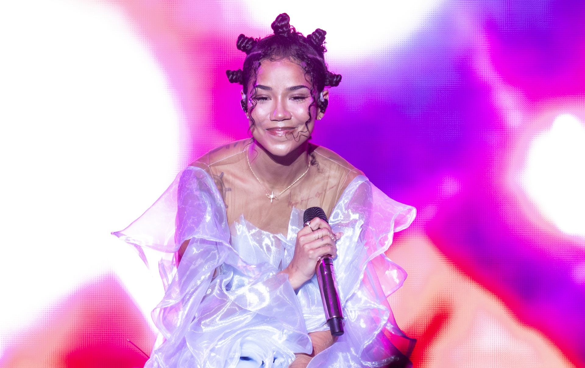 OAKLAND, CALIFORNIA - DECEMBER 02: Jhené Aiko performs at Oakland Arena on December 02, 2023 in Oakland, California.