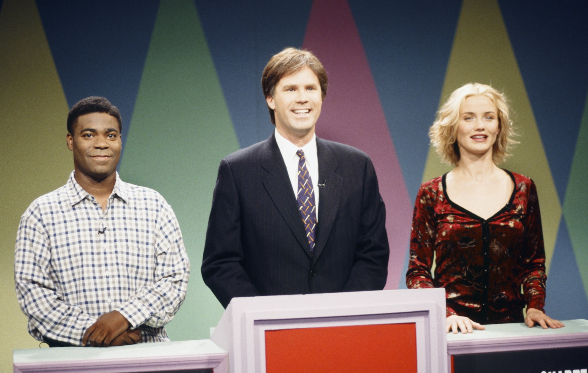 SATURDAY NIGHT LIVE -- Episode 1 -- Pictured: (l-r) Tracy Morgan as Walt Dupree, Will Ferrell as Tom Bergeron, Cameron Diaz as Danika Sharpe during "The New Hollywood Squares" skit on September 26, 1998.