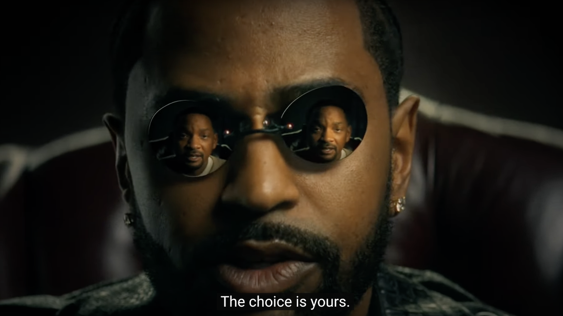Big Sean wearing sunglasses with a reflection of Will Smith in the lenses. The caption reads, "The choice is yours."