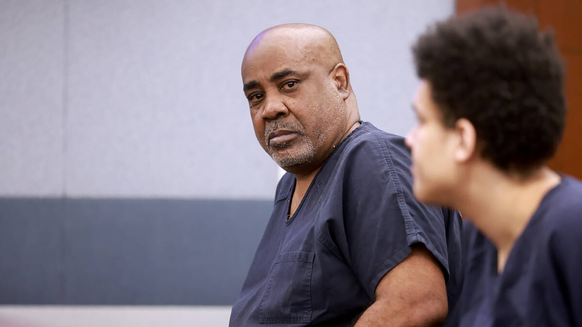 Duane "Keffe D" Davis, left, who is accused of orchestrating the 1996 slaying of hip-hop icon Tupac Shakur, waits to appear in court at the Regional Justice Center in Las Vegas on Tuesday, June 25, 2024.