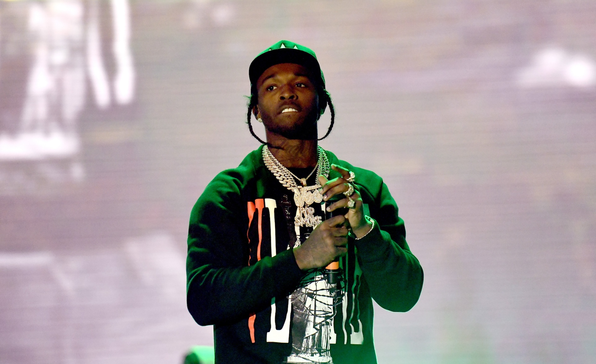 LOS ANGELES, CALIFORNIA - DECEMBER 15: Rapper Pop Smoke performs onstage during day 2 of the Rolling Loud Festival at Banc of California Stadium on December 15, 2019 in Los Angeles, California.