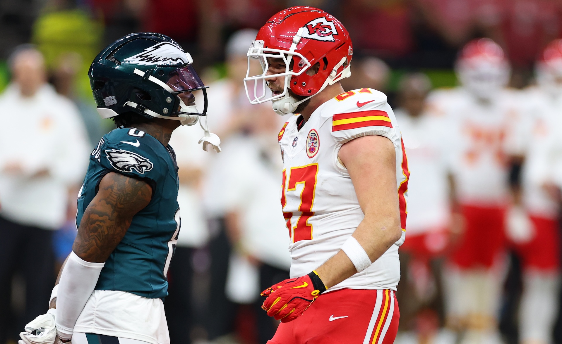 NEW ORLEANS, LOUISIANA - FEBRUARY 09: C.J. Gardner-Johnson #8 of the Philadelphia Eagles and Travis Kelce #87 of the Kansas City Chiefs face off in the first quarter during Super Bowl LIX at Caesars Superdome on February 09, 2025 in New Orleans, Louisiana.