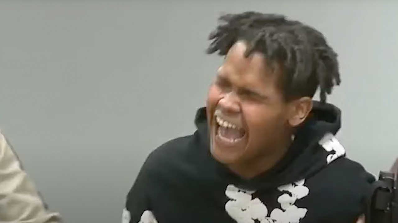 Sean Simpson reacting in court.