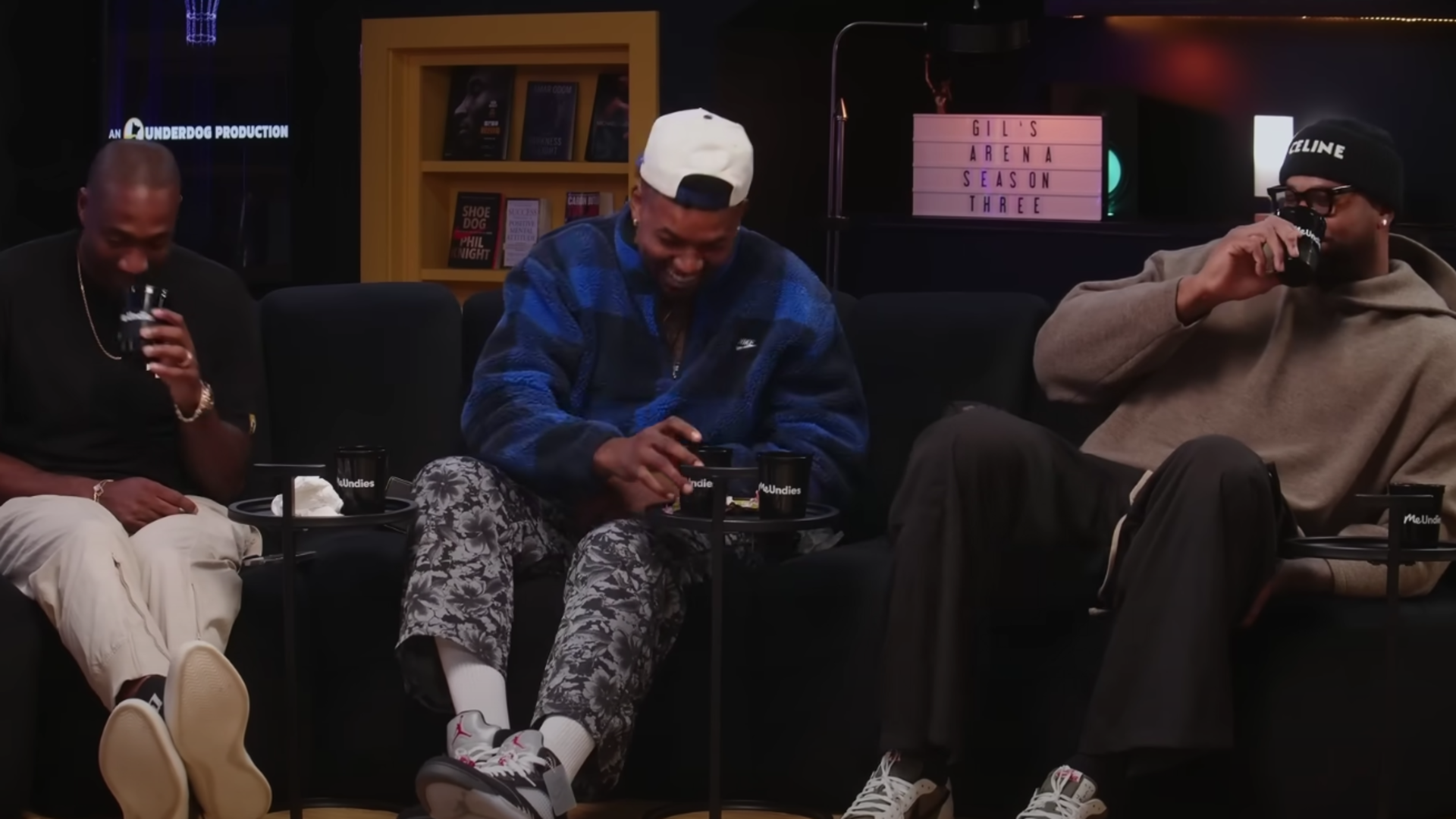 Gilbert Arenas, Nick Young and DeMarcus Cousins laughing on set.