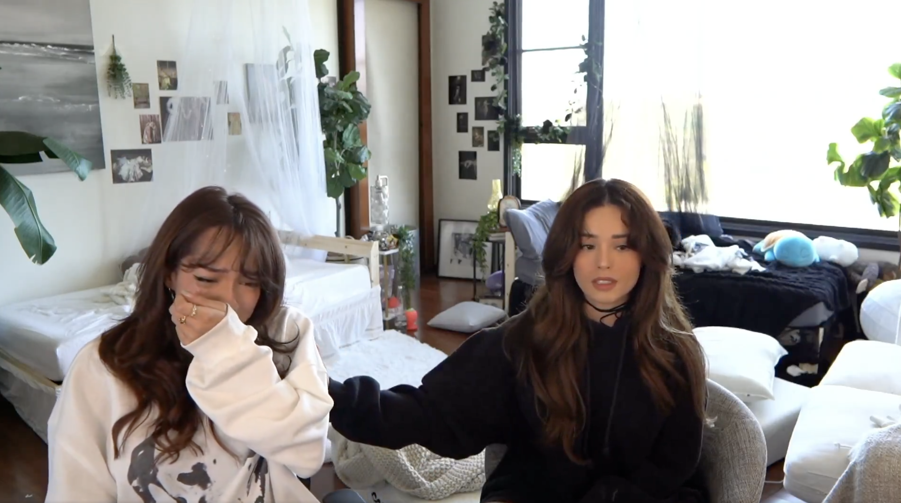 Cinna and Valkyrae stream on Twitch, visibly emotional as they recount the incident in which they were threatened on stream.