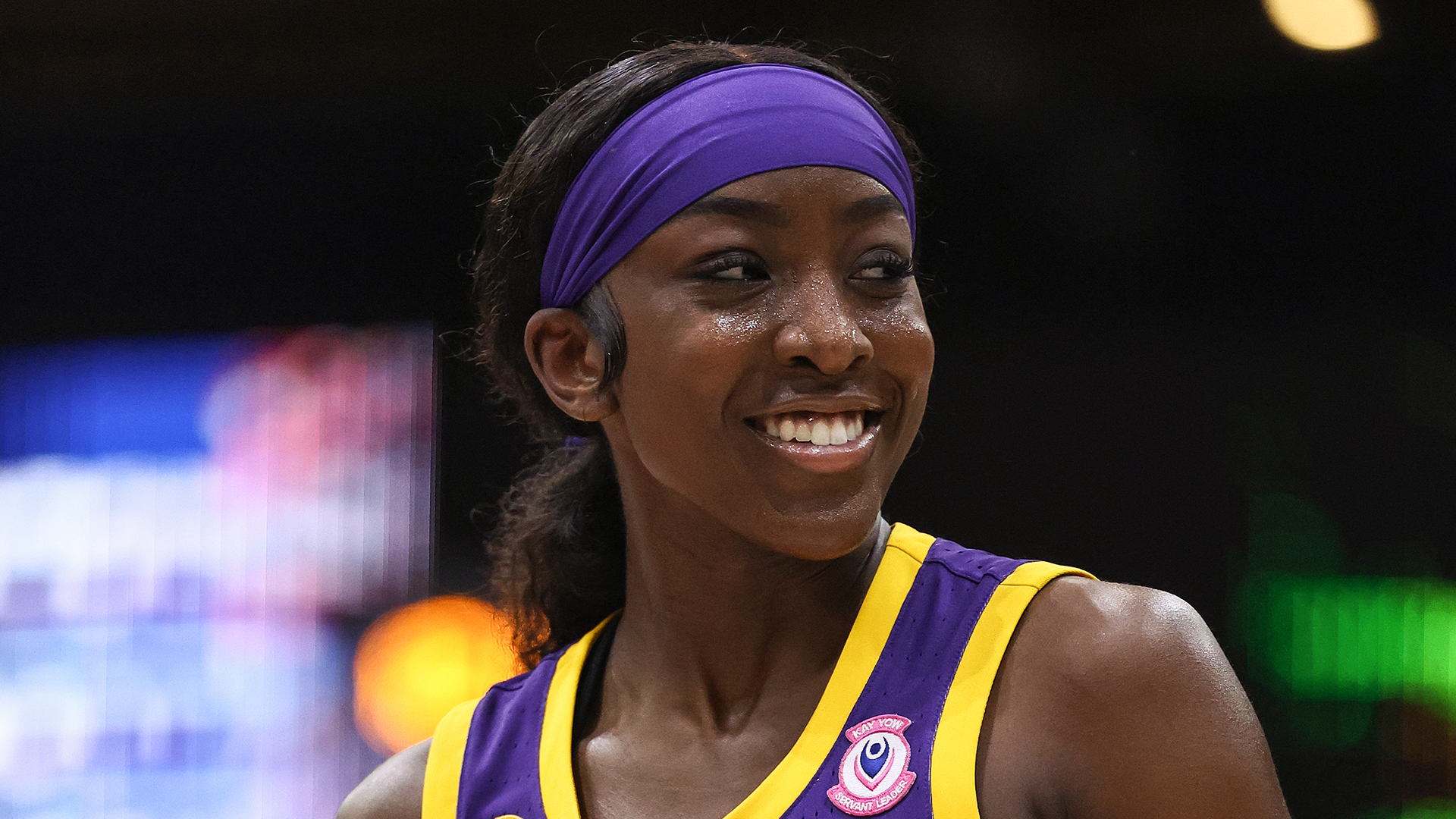 Flau'Jae Johnson #4 of the LSU Lady Tigers looks on during a game against the UIC Flames.