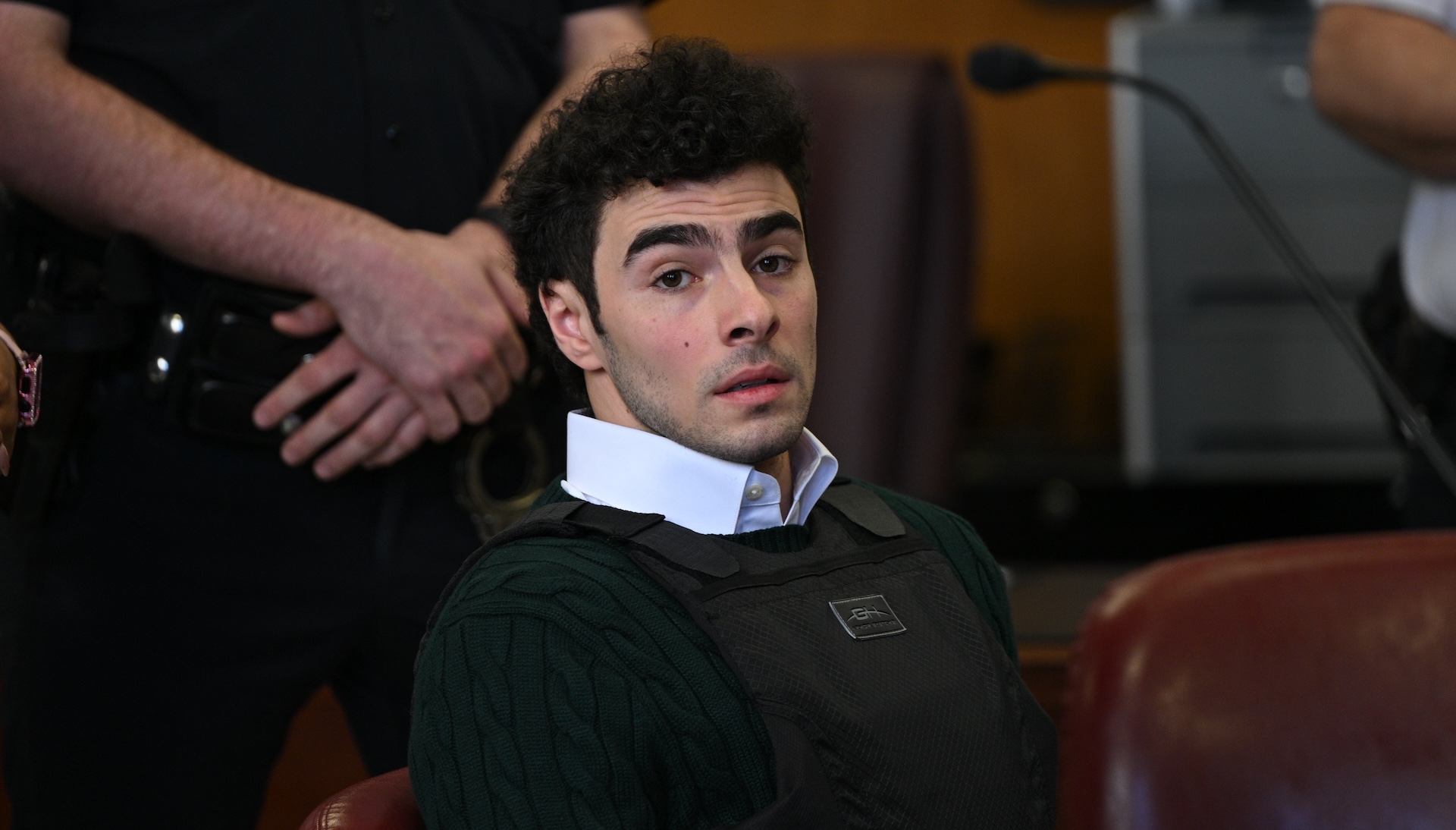 NEW YORK, NEW YORK - FEBRUARY 21: Luigi Mangione appears at a hearing for the murder of UHC CEO Brian Thompson at Manhattan Criminal Court on February 21, 2025 in New York City.