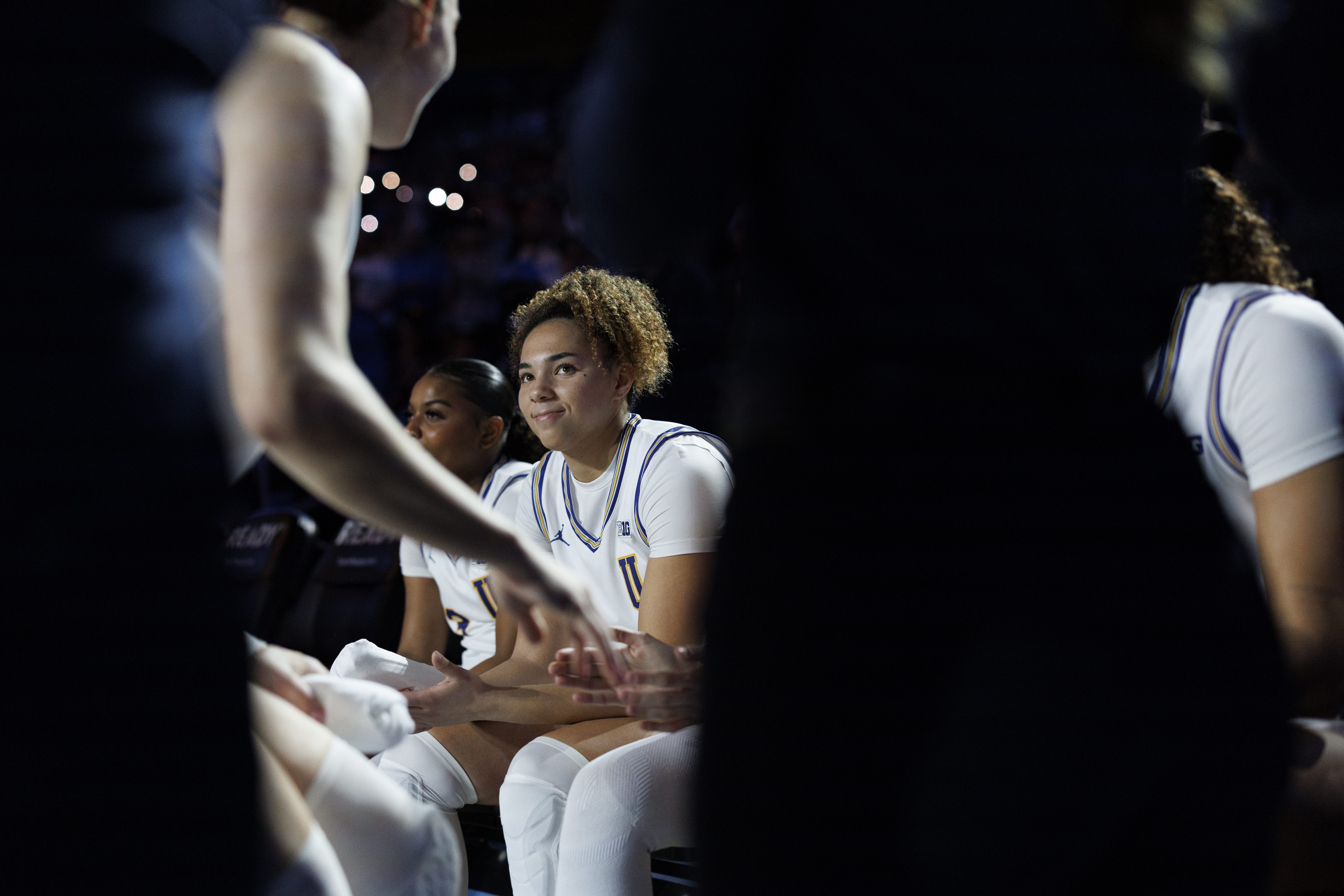 Kiki Rice in a dimly lit arena.