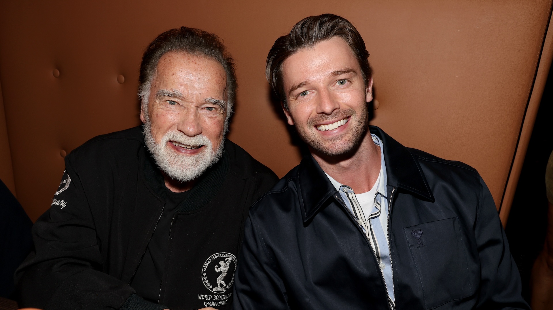 (L-R) Arnold Schwarzenegger and Patrick Schwarzenegger attend the Grand Opening of the brand new Planet Hollywood NYC hosted by Robert Earl, Alec & Hilaria Baldwin, Curtis “50 Cent” Jackson, and Boy George on March 11, 2025 in New York City.