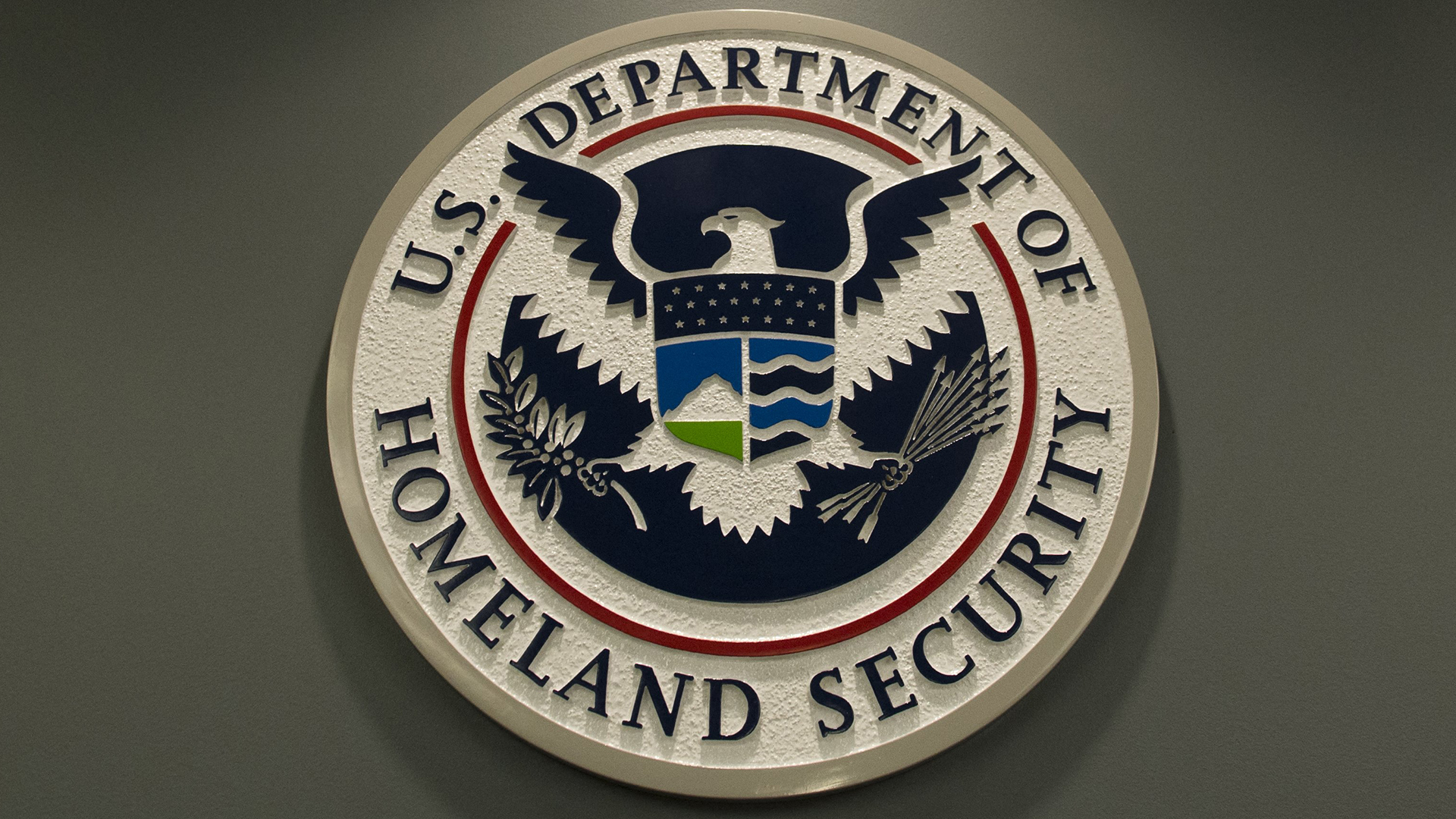 Seal of the U.S. Department of Homeland Security featuring an eagle, shield, and various symbols representing security and protection.