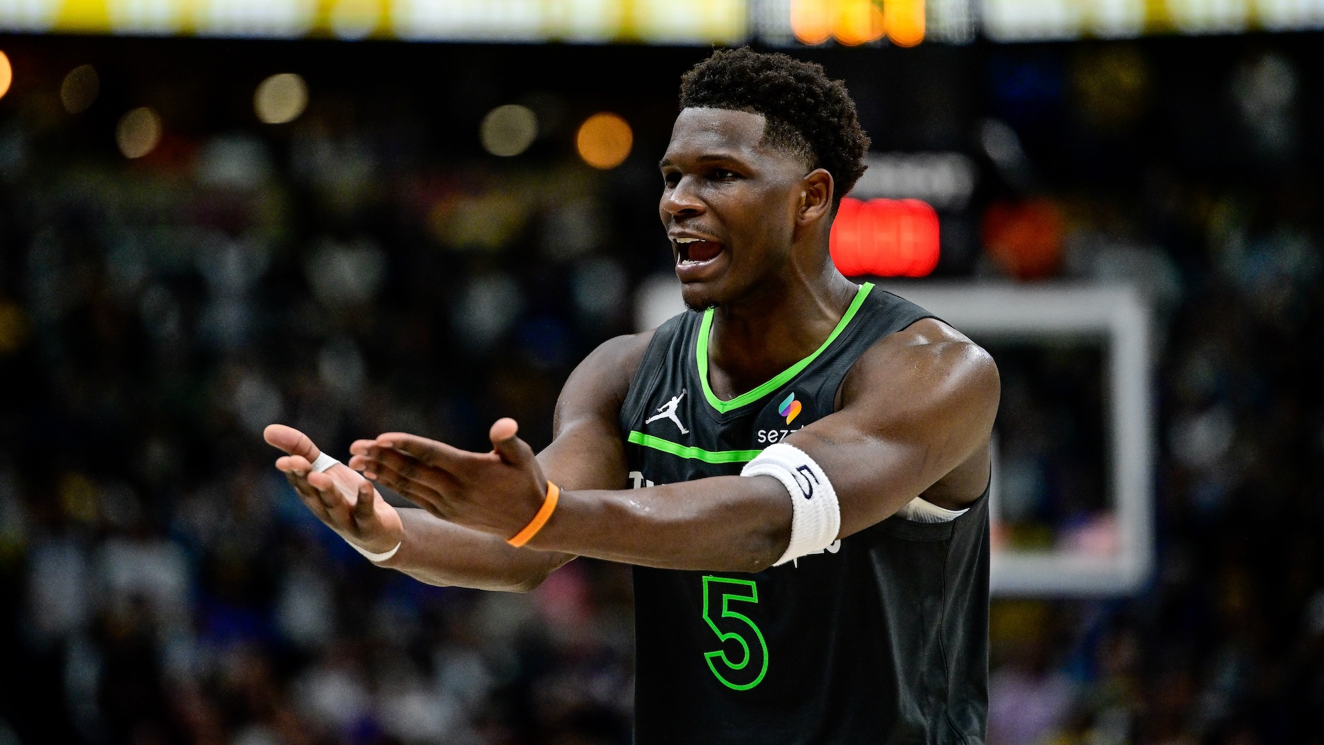 DENVER, COLORADO - APRIL 1: Anthony Edwards #5 of the Minnesota Timberwolves pleads to an official in the second overtime period against the Denver Nuggets at Ball Arena on April 1, 2025 in Denver, Colorado.