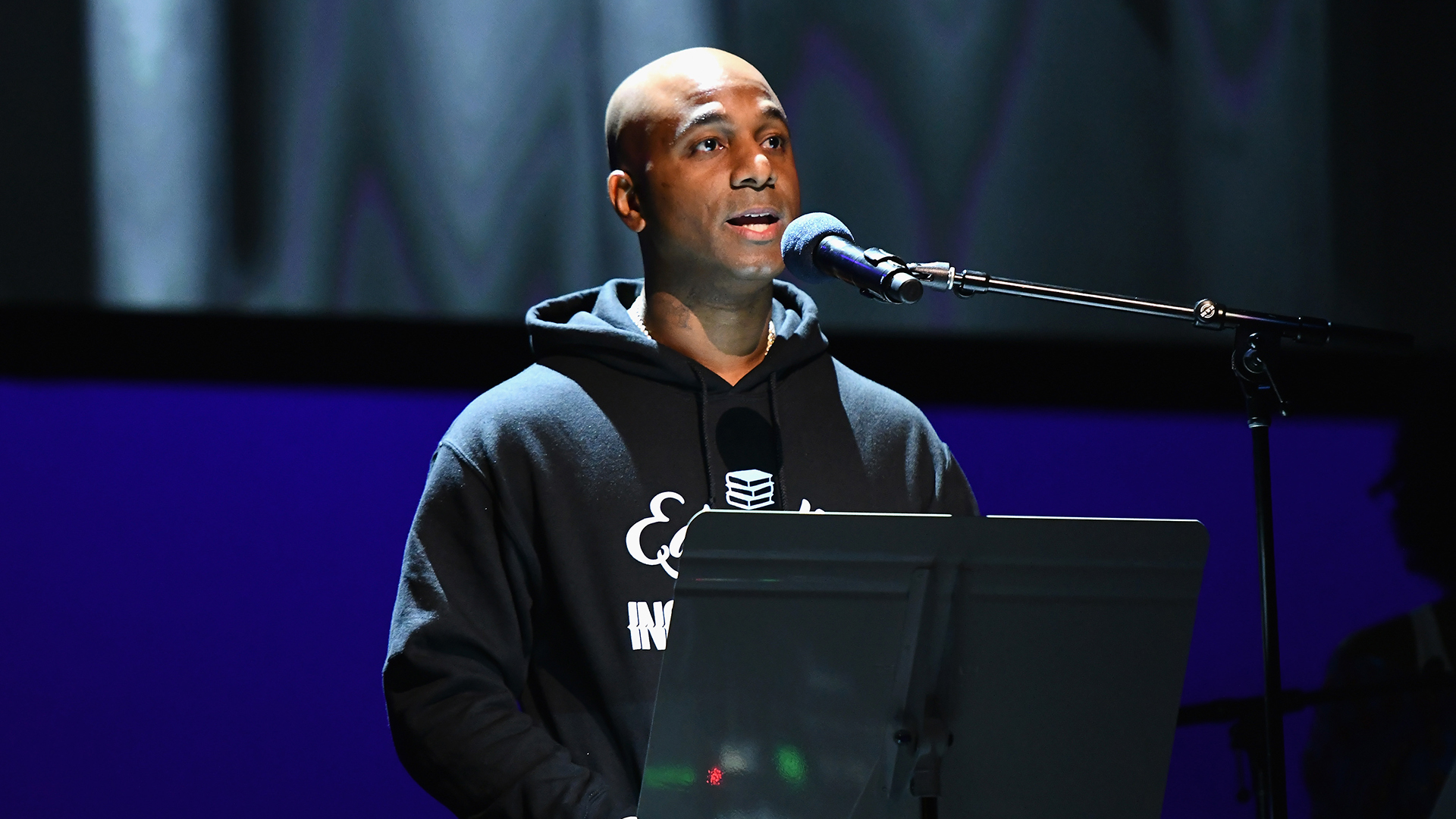 Wallo267 speaks onstage during Global Citizen Week: At What Cost? at The Apollo Theater.