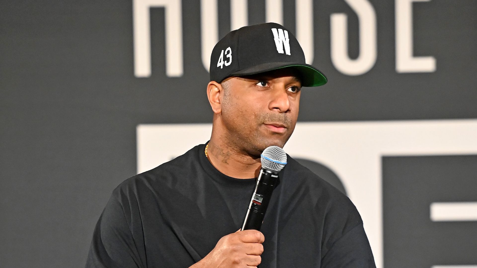 LOS ANGELES, CALIFORNIA - JUNE 25: Wallo267 speaks onstage during the "Live: Podcast with Million Dollaz Worth Of Game" panel at House Of BET on June 25, 2022 in Los Angeles, California. 