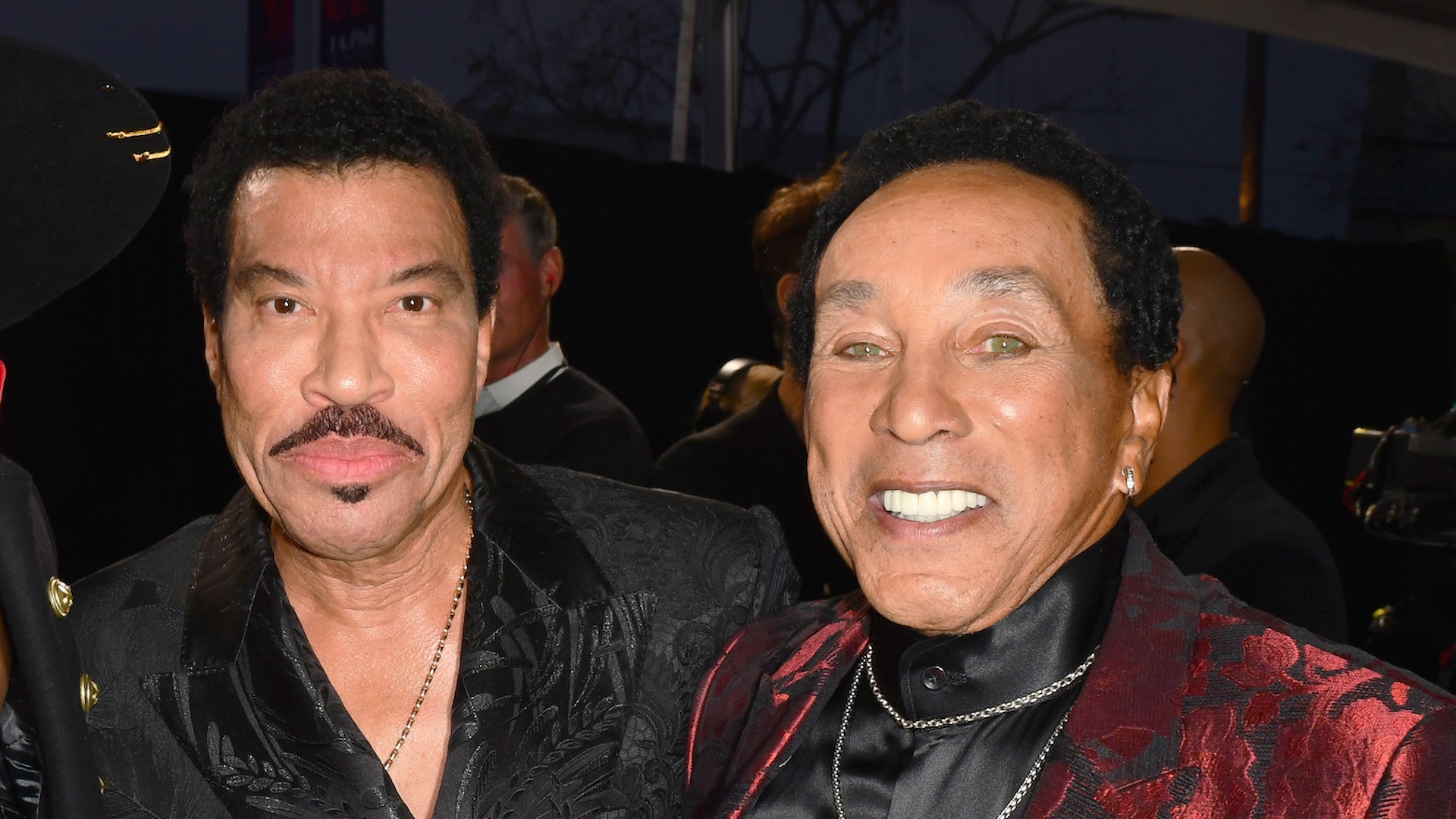 LOS ANGELES, CALIFORNIA - NOVEMBER 20: (L-R) Jimmie Allen, Lionel Richie, and Smokey Robinson attend the 2022 American Music Awards at Microsoft Theater on November 20, 2022 in Los Angeles, California.