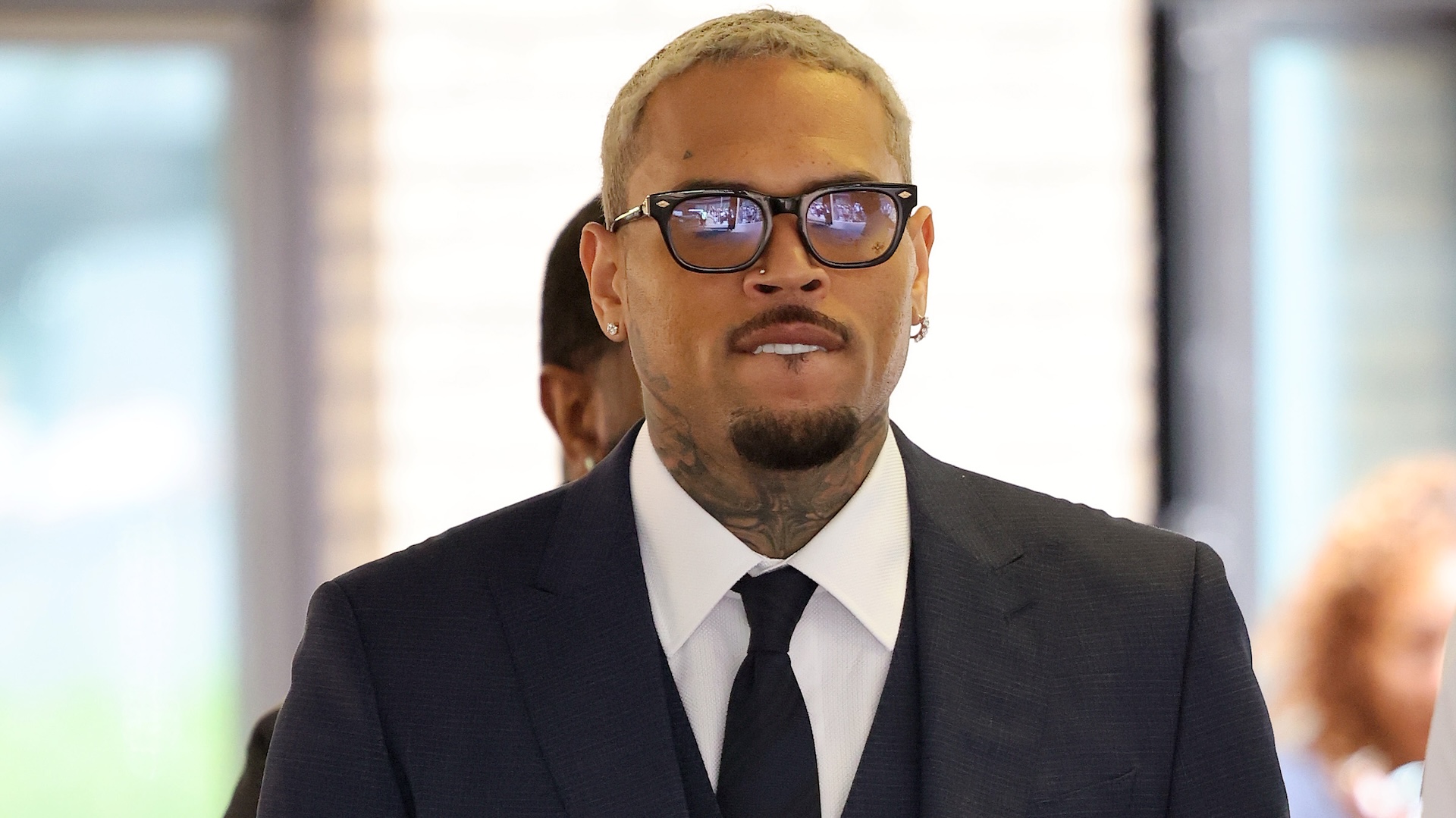 Watch Chris Brown Surprise Young Fan and Mom With $10,000...