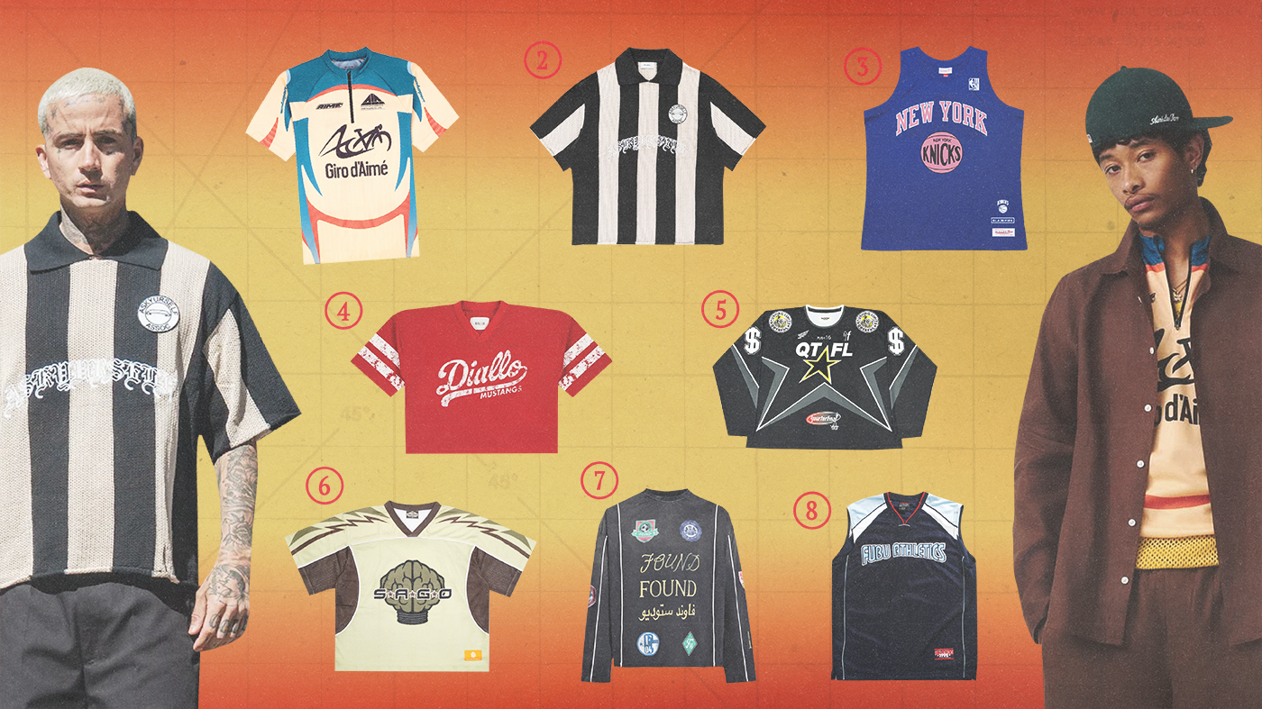 Two men wearing vintage sports jerseys. Various jerseys are displayed, including a New York Knicks tank top and striped designs.