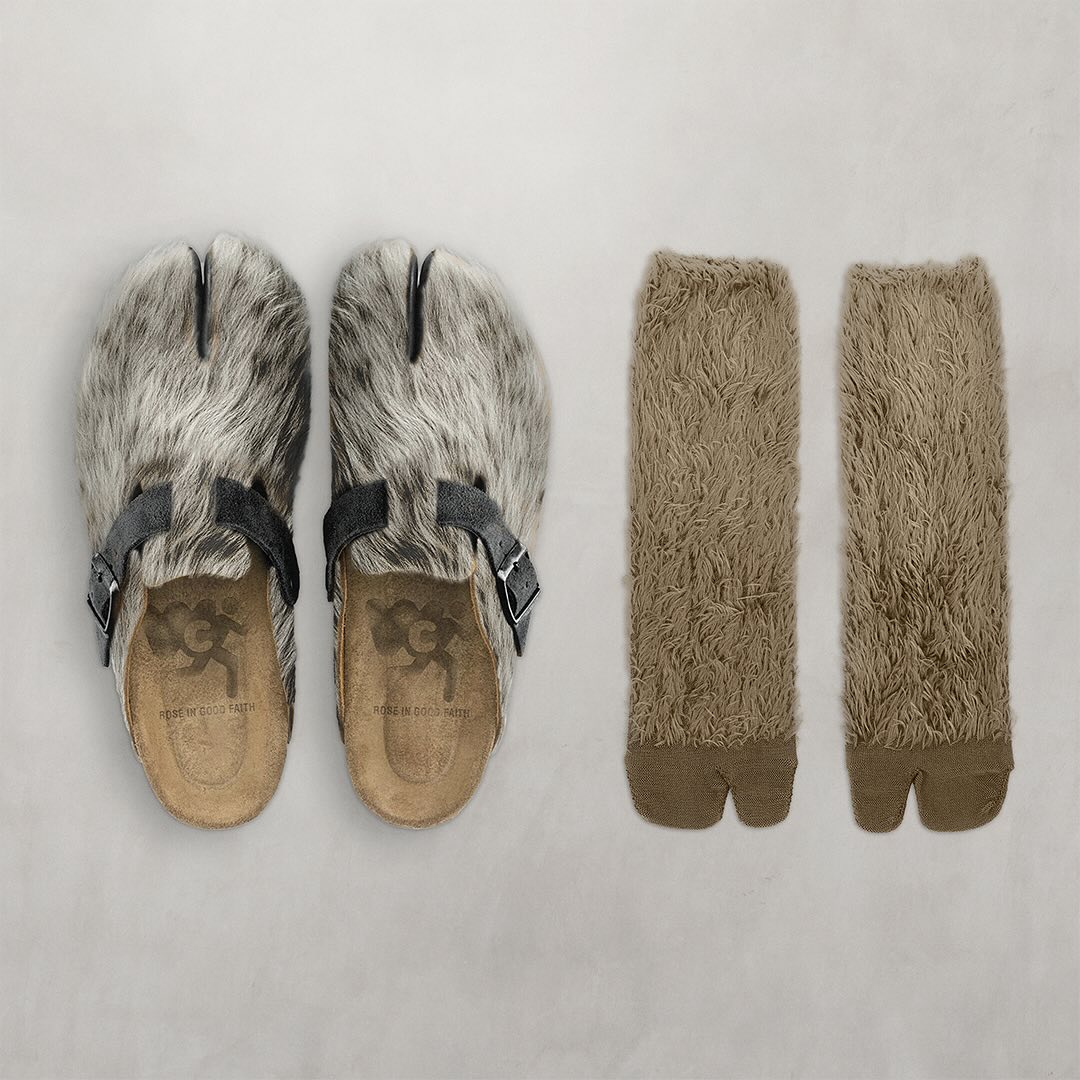 Furry cloven-toed shoes and matching furry socks on a neutral background.